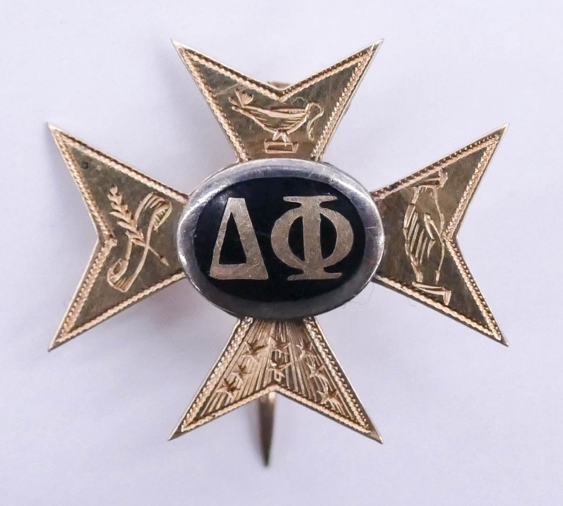 Antique Delta Phi 10k Gold Sorority Pin 1''. An early: Antique Delta Phi 10k Gold Sorority Pin 1''. An early over-sized active badge inscribed ''E.P. Goodell 91' (1891) Tau Chi Pi (Chapter)''. Excellent condition. It weighs 2.4 Grams.