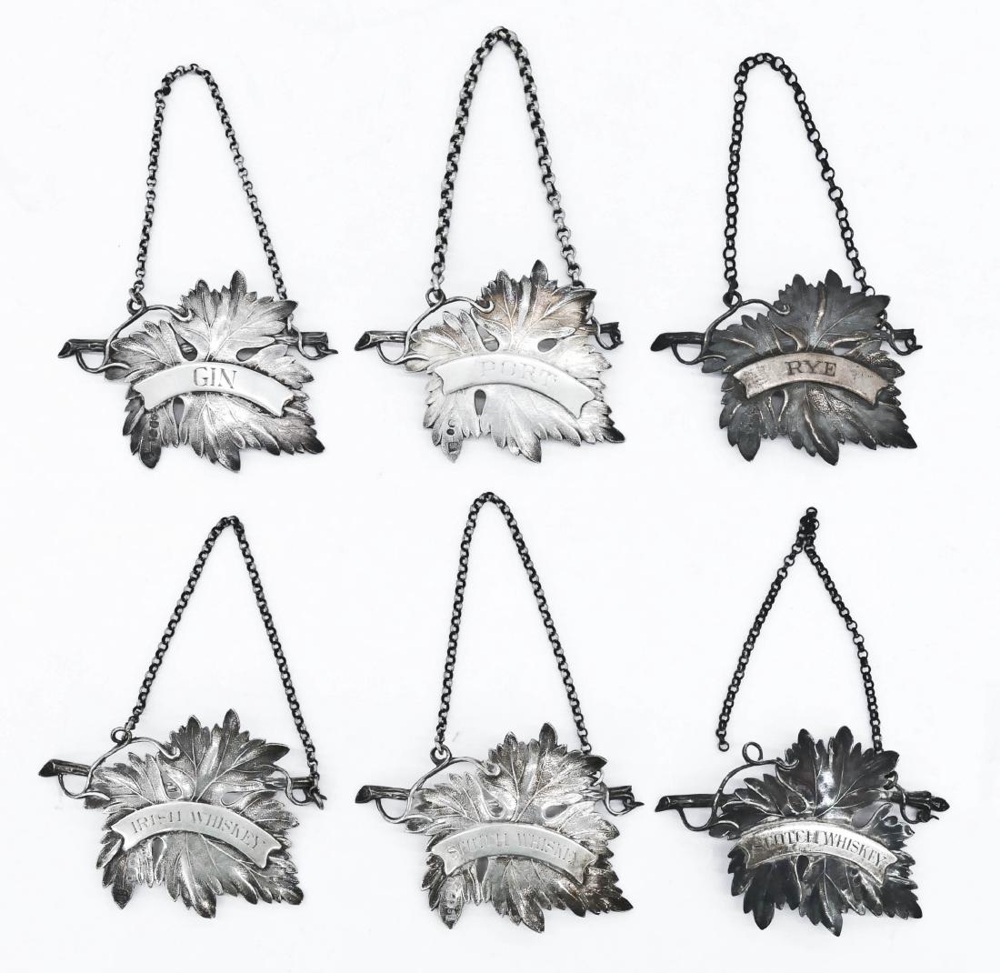 Set Victorian Sterling Leaf Spirit Labels by Charles: Set Victorian Sterling Leaf Spirit Labels by Charles Rawlings & Williams Summers, London 2.5''x3.25'' Each. Set of six silver decanter tags including Irish Whiskey, Scotch Whiskey (2), Rye, Gin, and P