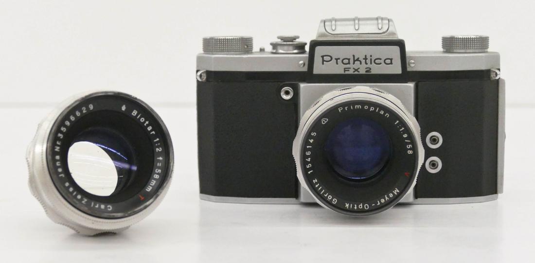 Praktica FX2 Camera with Zeiss Lenses. Includes a Meyer: Praktica FX2 Camera with Zeiss Lenses. Includes a Meyer Optik Primoplan 1.9/58mm and a Carl Zeiss Jena Biotar F2/58mm screw mount lenses. Clearn optics and clean body. Camera is functional.