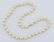 Lady's 14k Cream Pearl Necklace 16''. Includes (44) - 3
