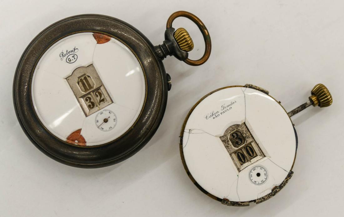 2pc Antique G.T. Swiss Jump Hour Pocket Watch &: 2pc Antique G.T. Swiss Jump Hour Pocket Watch & Movement. Includes a 55mm gun metal case watch and a Cahen Irmaos Sao Paulo movement. Both are non working. Est. $200-400