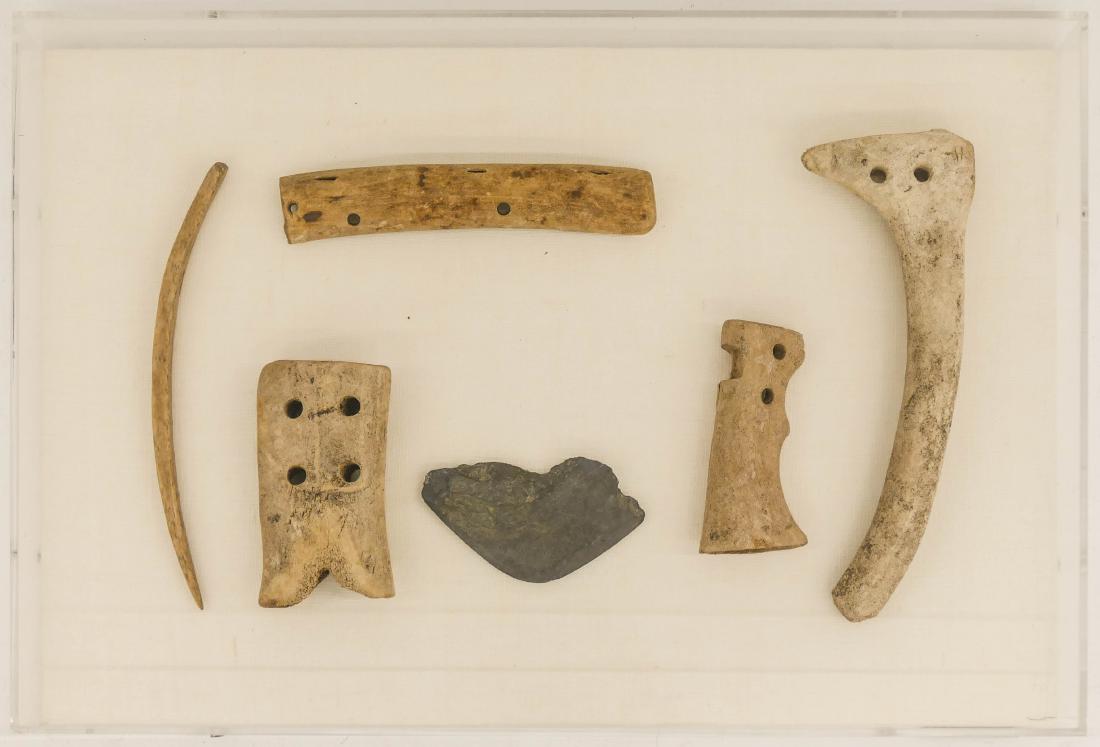 Anna Olanna (20th Cent. Inupiaq) ''Tool'' Artifacts: Anna Olanna (20th Cent. Inupiaq) ''Tool'' Artifacts Shadowbox Framed 12''x18''x2.5''. An assemblage of old Alaskan native bone implements. Atlantic Richfield Company Corporate Art Collection label on