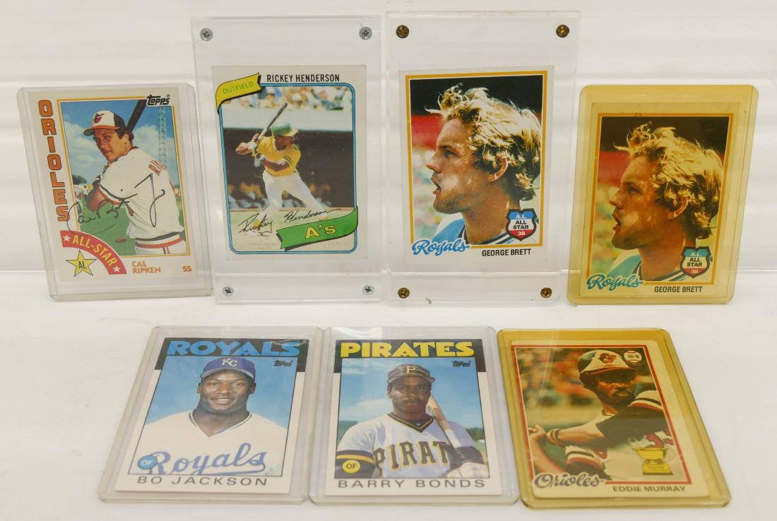 7pc Baseball HOF Rookie Trading Cards. A fresh group of: 7pc Baseball HOF Rookie Trading Cards. A fresh group of ungraded 1970's and 1980's cards including 1980 Topps Rickey Henderson Rookie #482, (2) 1978 Topps George Brett Rookie #100, 1978 Topps Eddie Mu