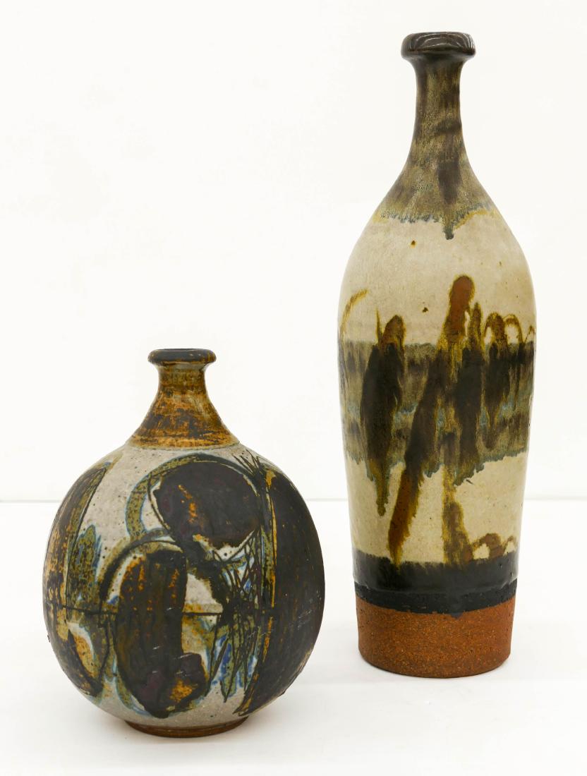 Robert Sperry (1927-1998 Washington) Two Early Bottle: Robert Sperry (1927-1998 Washington) Two Early Bottle Vases Glazed Stoneware. Includes a tall drip glazed vase 13''x4'' and a smaller sgraffito decorated 1960 vase 7''x5''. Both are signed on bottom.