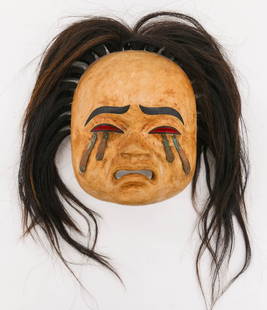 Beau Dick (1955-2017 Kwakwaka'wakw) Mourning Child Mask: Beau Dick (1955-2017 Kwakwaka'wakw) Mourning Child Mask 1999 Cedar 7''x7''. Carved and painted cedar mask with applied copper tears. Signed and dated on verso. Excellent condition. Northwest coast nat