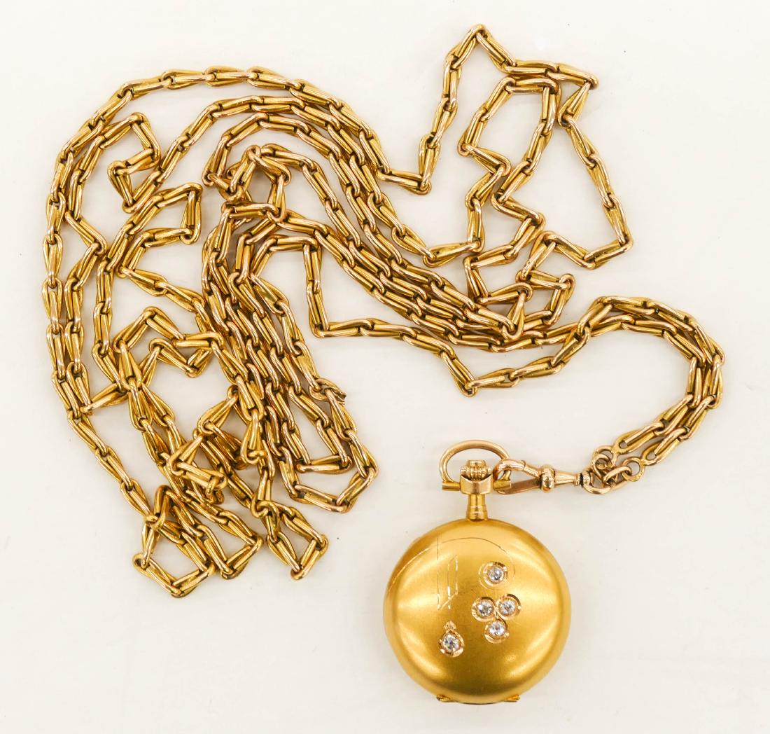 Lady's Art Nouveau 14k Diamond Pocket Watch on Chain: Lady's Art Nouveau 14k Diamond Pocket Watch on Chain 59''. Includes a 30mm case Seraph Swiss Decoration de Geneve 1a Qte Patent No.22031 marked 14k pocket watch set with (5) Old European cut diamonds 