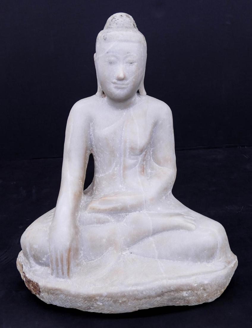 Burmese Alabaster Stone Seated Buddha 15''x13''. A fine: Burmese Alabaster Stone Seated Buddha 15''x13''. A fine hand carved white alabaster stone seated buddha. Some surface wear and edge flaking to base from age. 18th century, similar to Sino-Tibetan or C