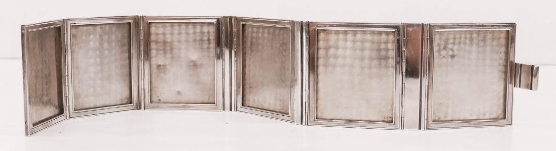Bulgari Sterling Folding 6-Picture Travel Frame: Bulgari Sterling Folding 6-Picture Travel Frame 3.25''x3''. Unusual custom made 950 sterling silver folding frame that will fit six individual photographs of 3''x2.5'' each. Marked at edge ''Bvlgari 9