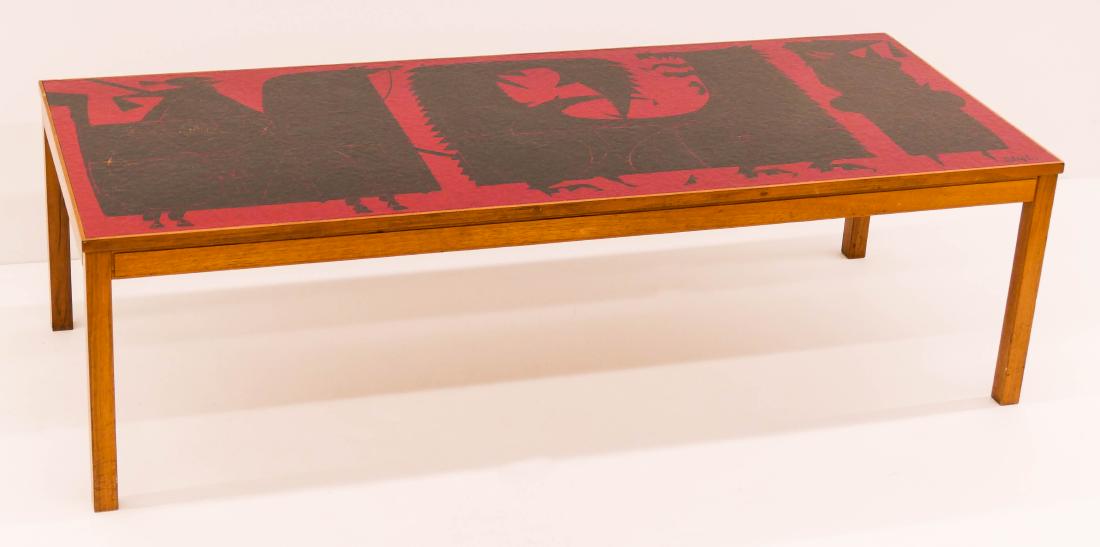 Stig Lindberg (1916-1982 Swedish) Knight and Dragon: Stig Lindberg (1916-1982 Swedish) Knight and Dragon Enameled Metal Coffee Table 15.5''x53.75''x22''. Produced with David Rosen by Nordiska Kompaniet, Sweden circa 1960. Enameled plaque on top measures