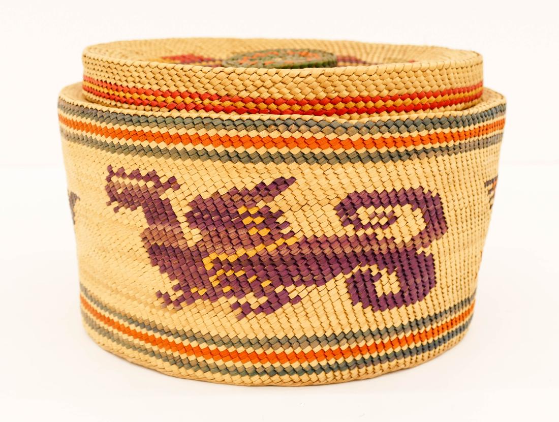 Vintage Makah Large Dragon Covered Indian Basket: Vintage Makah Large Dragon Covered Indian Basket 6''x10''. Unusual large woven basket with dragon, bird on arrow, and whale motifs. A few small chips to edge. Overall excellent condition. Similar to A