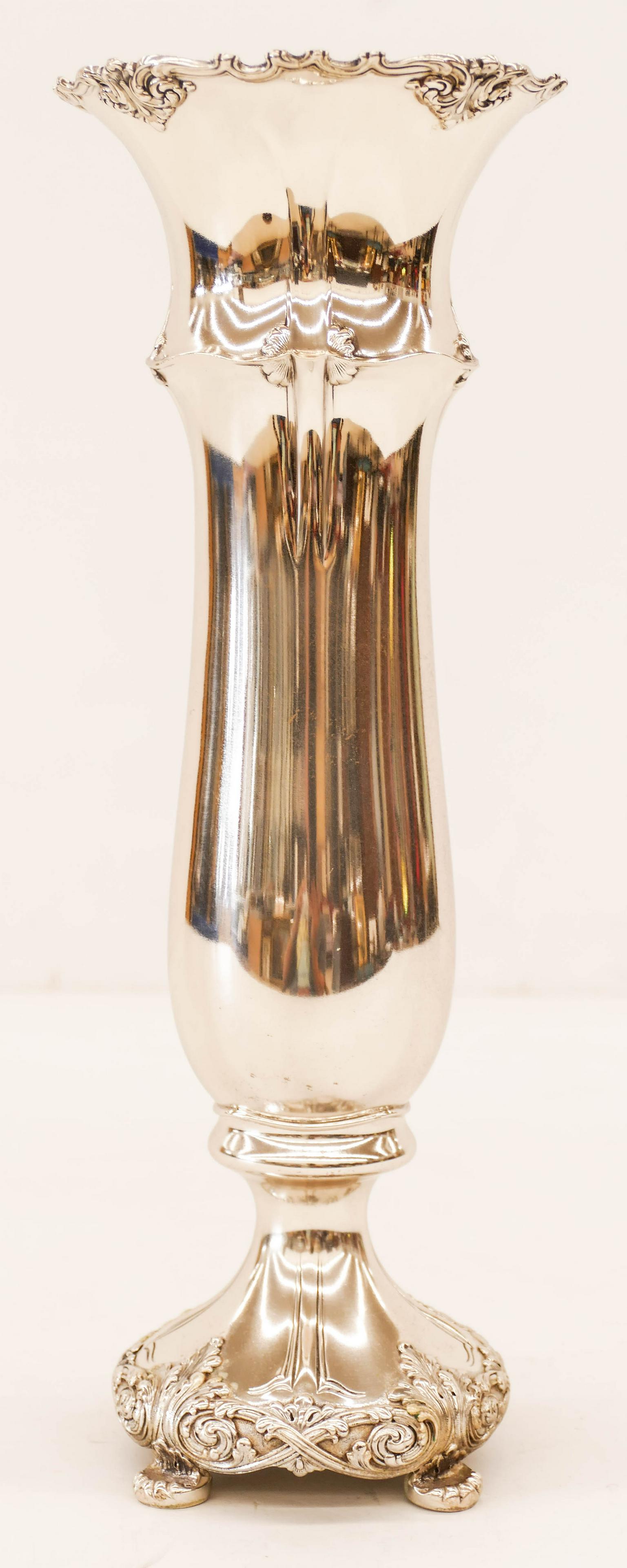Tiffany & Co. Sterling Silver Acanthus Vase 14''x5''.: Tiffany & Co. Sterling Silver Acanthus Vase 14''x5''. An ornate tall vase with scrolling acanthus leaf and vine edge motifs. Clearly marked on bottom with John C. Moore III (1907-1947) director. It we