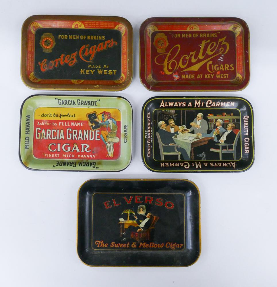 5pc Antique Cigar Advertising Tin Tip Trays: 5pc Antique Cigar Advertising Tin Tip Trays. Includes (2) Cortez Cigars (Key West, FL), Mi Carmen, Garcia Grande, and El Verso. El Verso tray measures 4.5x6.5'', Mi Carmen, Cortez, and Garcia Grande t