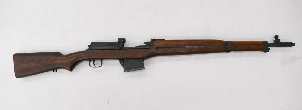 Egyptian Hakim 7.9mm Caliber Semi-Automatic Rifle: Egyptian Hakim 7.9mm Caliber Semi-Automatic Rifle. Serial #39721. Fir condition. Lot requires FFL or background check made by Pintos Guns of Renton, Washington. They charge a $25 transfer fee for each