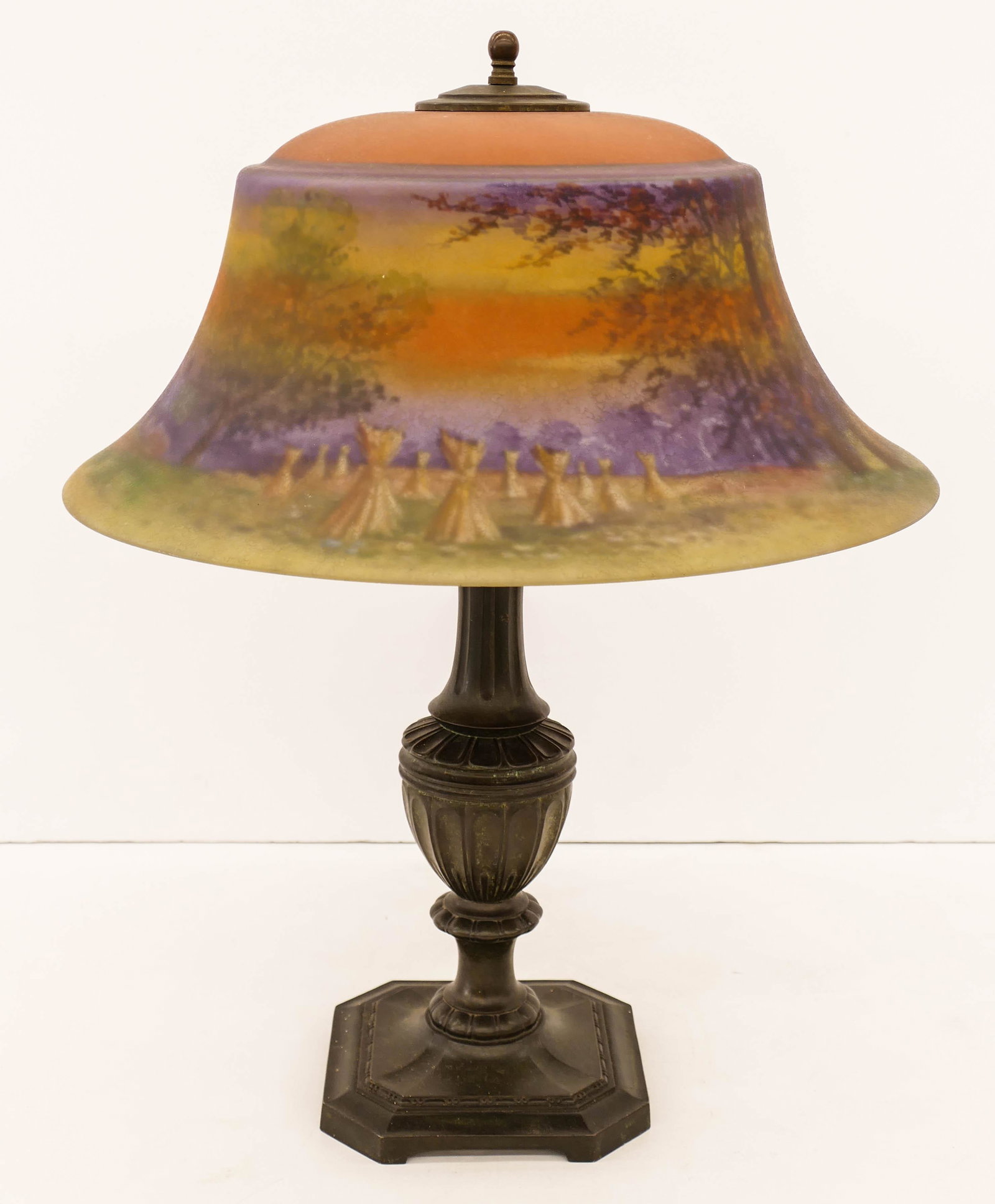 Pairpoint Haystacks Reverse Painted Shade Table Lamp: Pairpoint Haystacks Reverse Painted Shade Table Lamp 22''x17''. Multi-colored two-light reverse painted shade with countryside homestead scene and haystacks. Marked Pairpoint D3053 metal base. Sockets