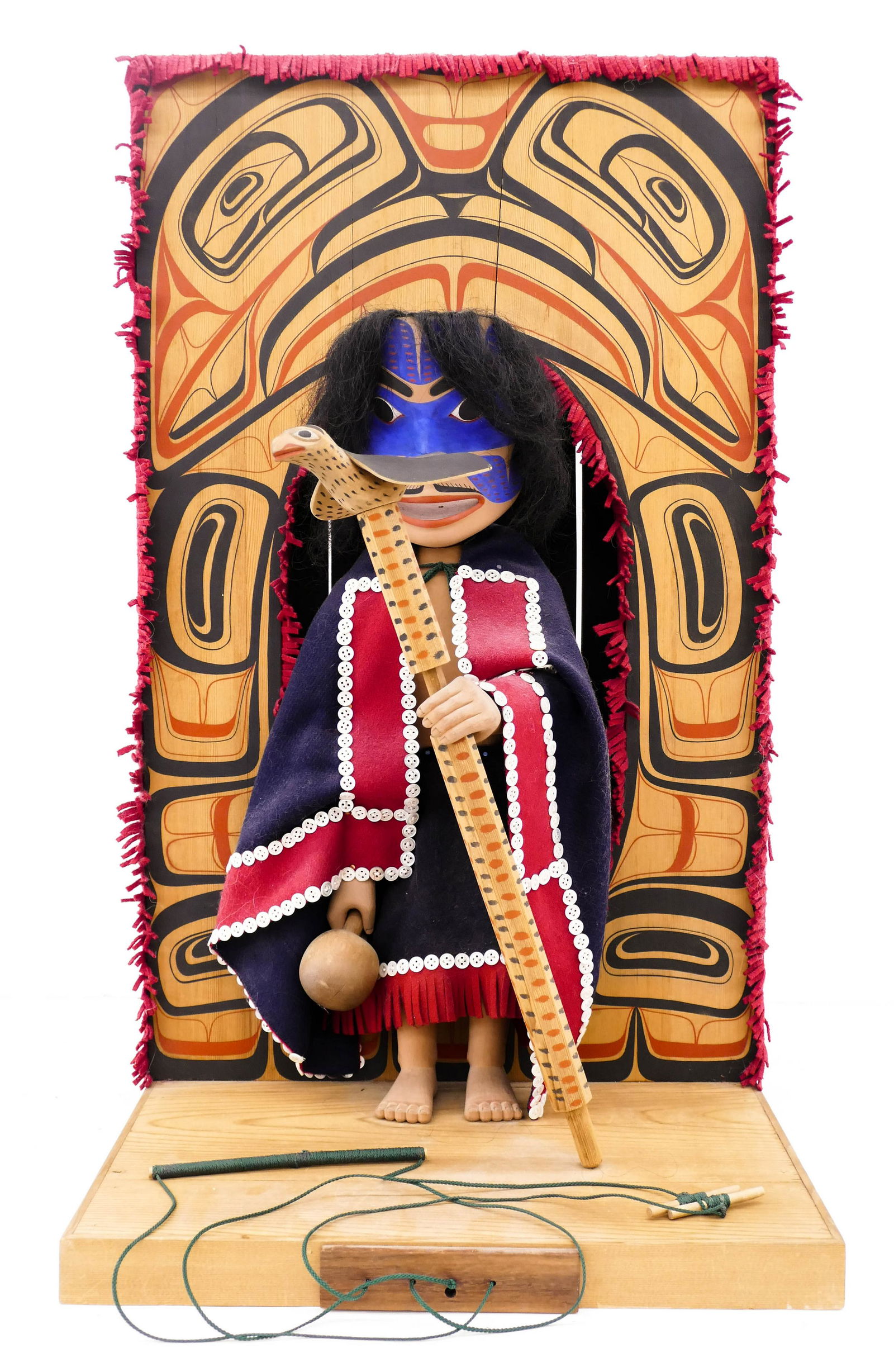 Duane Pasco (b.1932 Washington) Native Dancer: Duane Pasco (b.1932 Washington) Native Dancer Marionette Puppet Cedar with Felt Button Blanket 31.5''x18.5''x18.5''. Exceptional and scarce articulated puppet with Northwest Coast carved and painted c