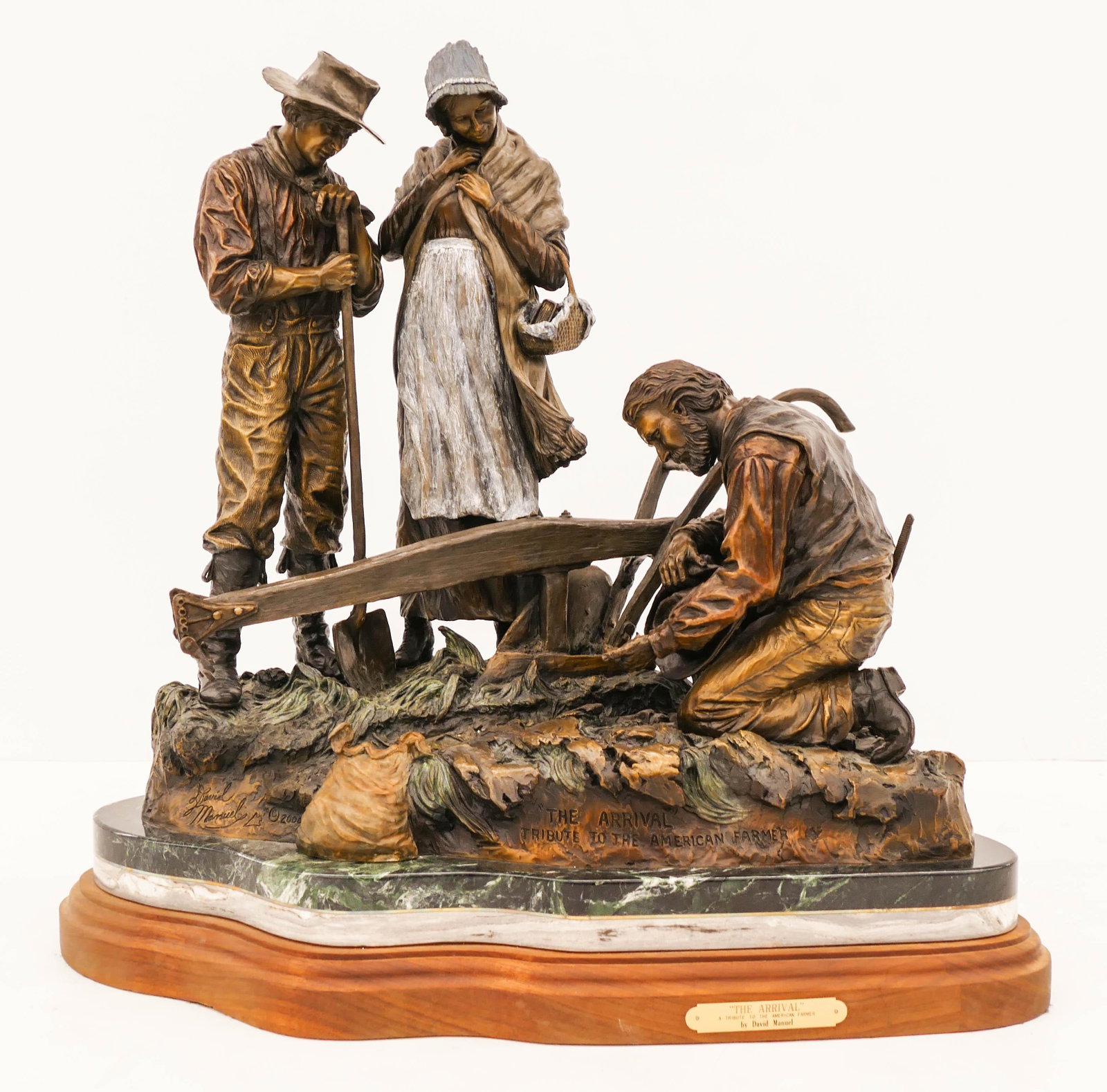 David Manuel (b.1940 Oregon) ''The Arrival'' (Tribute: David Manuel (b.1940 Oregon) ''The Arrival'' (Tribute to The American Farmer) 2000 Patinated Bronze Sculpture 23''x23''. Impressive large western sculpture of a family of farmers with plow, seeding th
