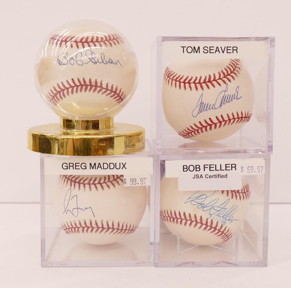 4pc Baseball HOF Pitcher Signed Baseballs- Maddux,: 4pc Baseball HOF Pitcher Signed Baseballs. Includes balls signed by Greg Maddux, Bob Feller, Bob Gibson, and Tom Seaver. Bob Feller ball comes with JSA COA #N50265. The remaining three balls come with