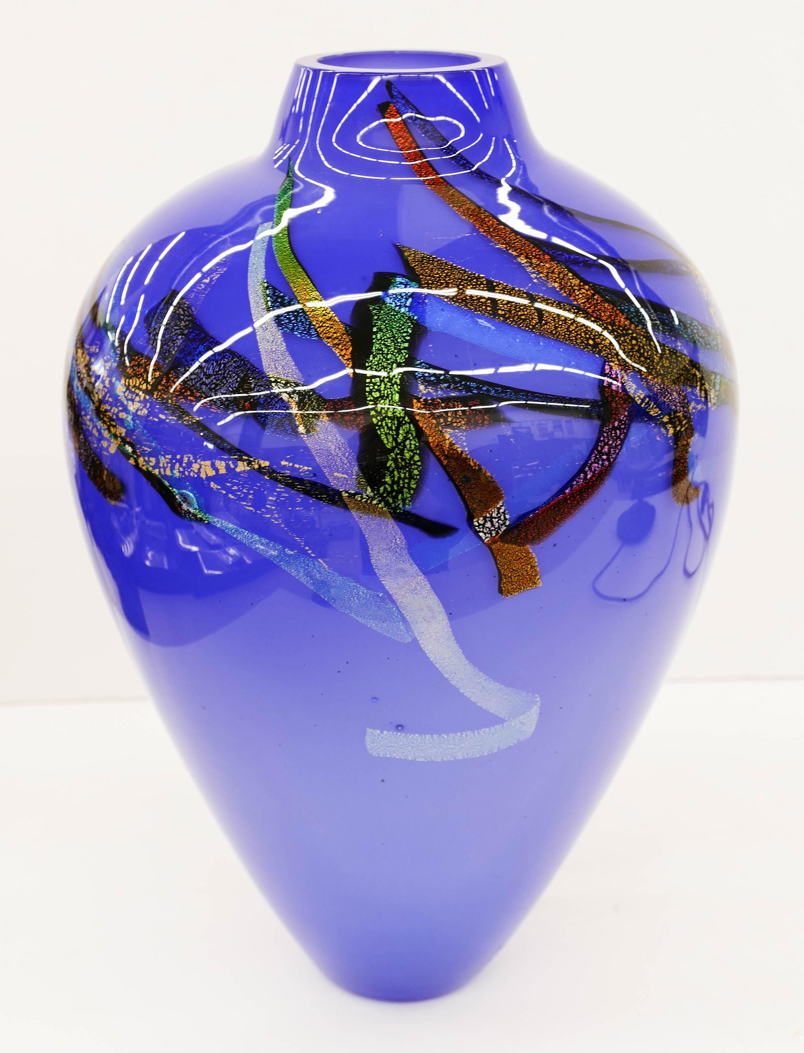 Eric Brakken Glasshouse Studio 1994 Glass Vase: Eric Brakken Glasshouse Studio 1994 Glass Vase 12.5''x8''. A cobalt blue vase with iridescent gold leaf motifs on shoulder. Signed and dated on side with G4304 numbering on bottom. Excellent condition
