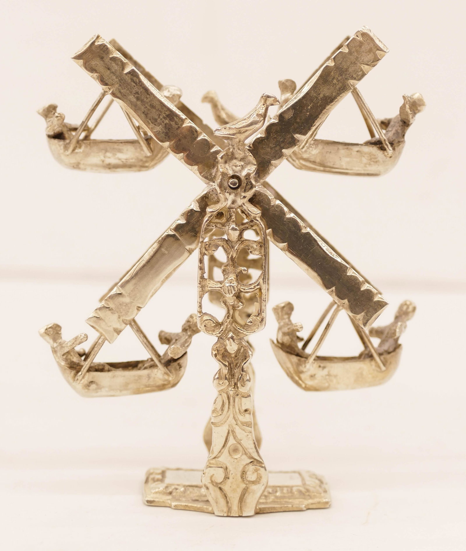 Antique Dutch Silver Ferris Wheel Miniature: Antique Dutch Silver Ferris Wheel Miniature 3.5''x2.5''. Articulated miniature model. Hallmarked with date code for 1905. It weighs 69 grams. Excellent condition.