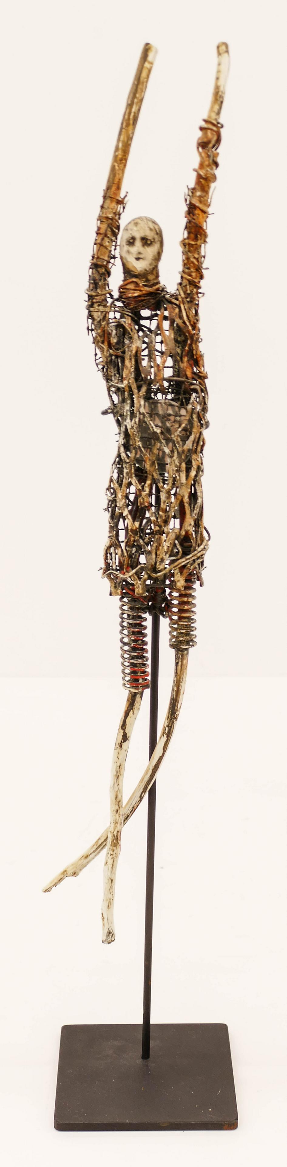 Terry Turrell (b.1946 Washington) ''Arms Up'' (See: Terry Turrell (b.1946 Washington) ''Arms Up'' (See Through Mirror) Mixed Media Sculpture 19''x2.5''. An elongated figured composed of metal wire, painted wood, springs, and a mirror piece. Comes on fi