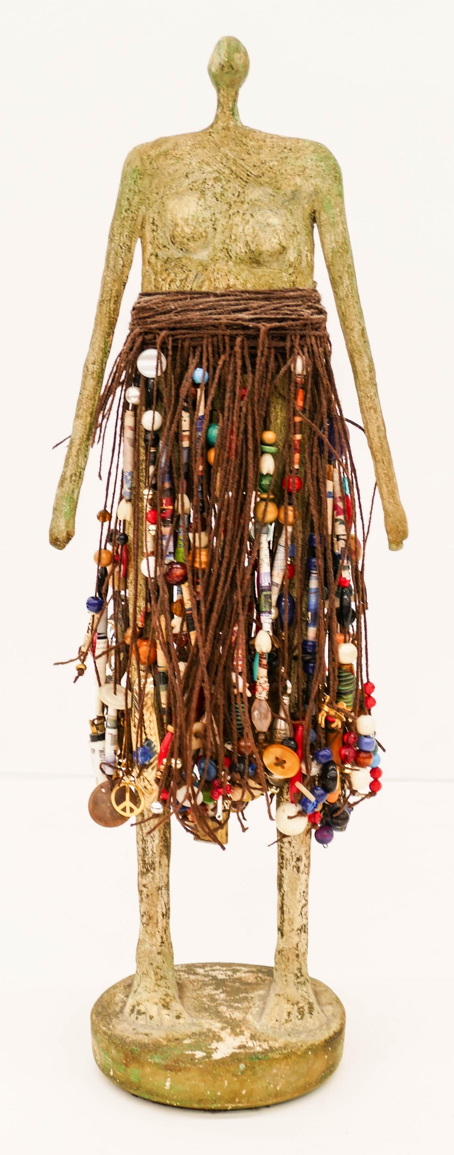 Ron Allen (20/21st Cent. American) Green Figure with: Ron Allen (20/21st Cent. American) Green Figure with Skirt 1994 Mixed Media Sculpture 19.5''x7''. Painted plaster, raffia, and beads. Signed and dated on base. Overall excellent condition. Represented