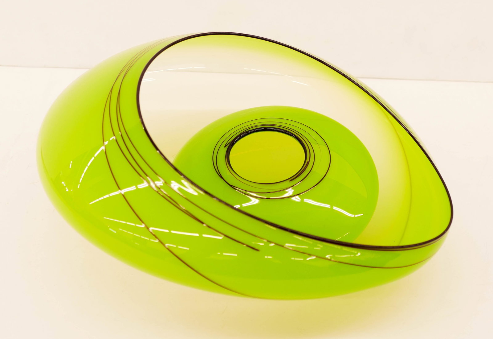 Dale Chihuly (b.1941 Washington) Vienna Green Basket: Dale Chihuly (b.1941 Washington) Vienna Green Basket Set 2008 Blown Glass 5''x11''. A two piece nesting set with black lip wraps. Smaller element measures 2.5''x6''. Portland Press Edition signed and 