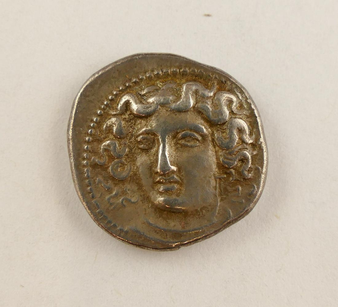 Thessaly Larissa AR Drachm: Ancient- Greek. Thessaly Larissa AR Drachm (19mm, 6.05g. Ungraded. Obverse, Head of nymph Larissa facing, turned slightly left, hair in sphendone. Reverse, horse kneeling to left. c. 4th Century BC