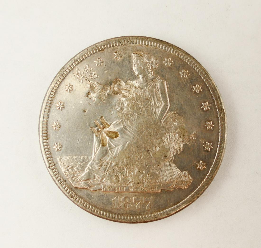 US 1877 Silver Trade Dollar w/ Chop Marks: US 1877 Silver Trade Dollar w/ Chop Marks. Ungraded.