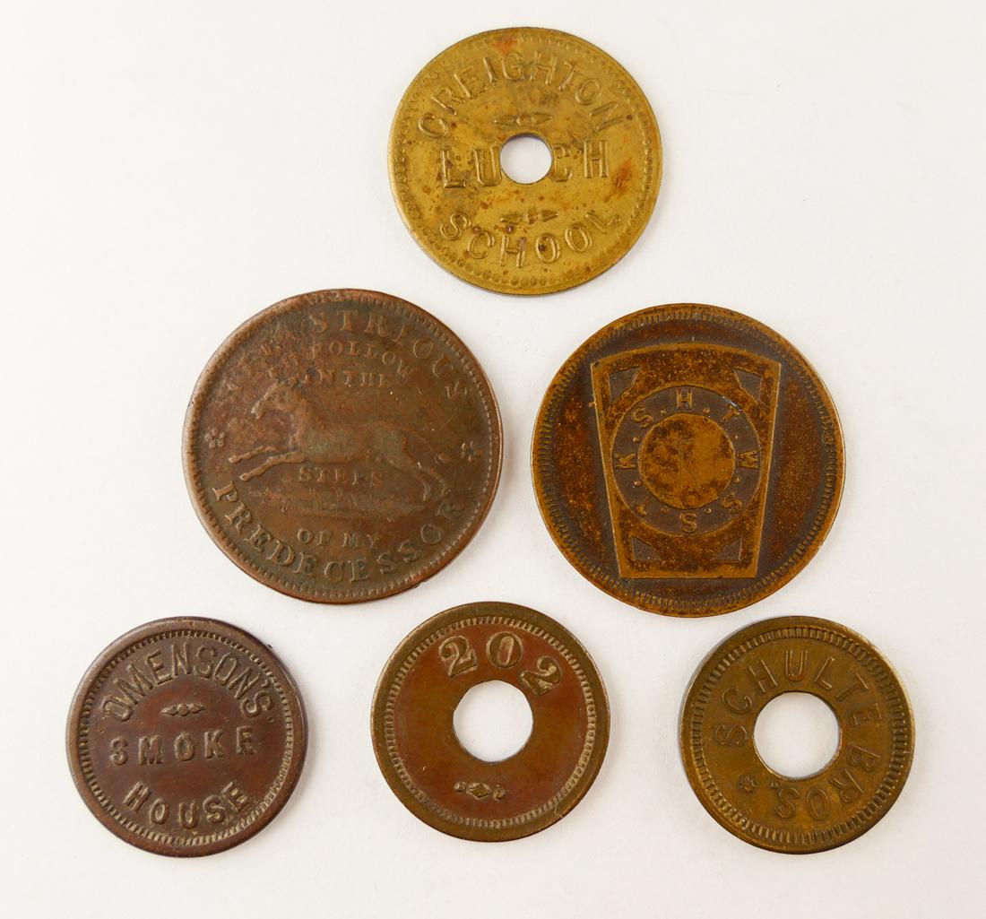 6pc Old Trade & 1837 Hard Times Token: 6pc Old Trade & 1837 Hard Times Token. Includes (1pc) One Penny 'K.S.H.T.W.S.S.T.', (3pc) 5 Cent Tokens- Schulte Bros, '202' 5 Cents, Omenson's Smoke House 5 Cents, (1pc) Creighton School Lunch 25 Cen
