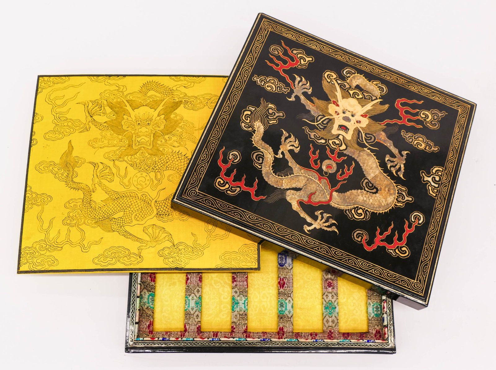 Chinese Imperial Dragon Gilt Lacquered Ink Stone Box: Chinese Imperial Dragon Gilt Lacquered Ink Stone Box 11''x12''x1.75''. Impressive box with five-clawed imperial dragon motif and silk fitted interior for ten ink cakes. Some age cracking with chipping
