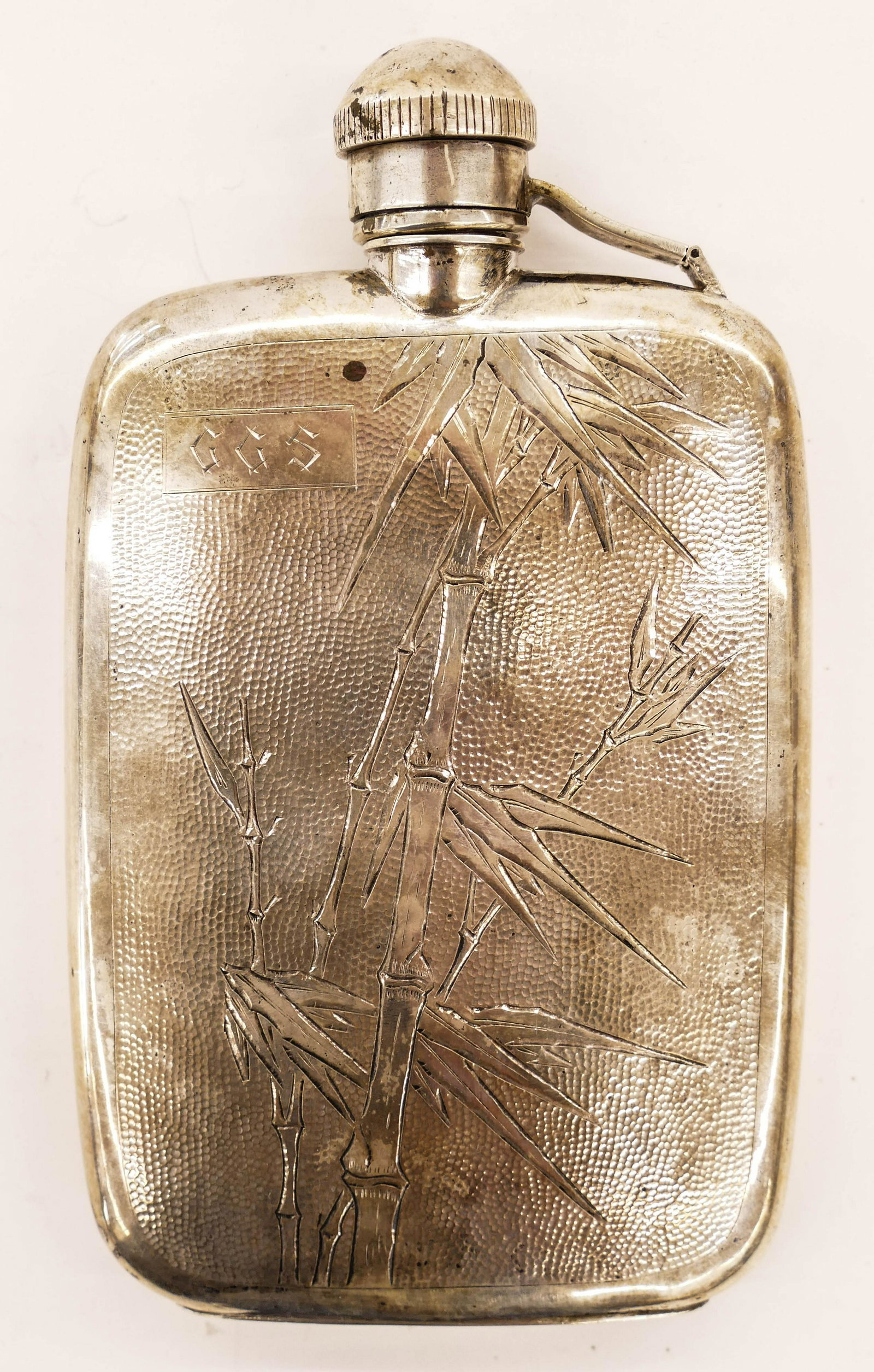 Chinese Silver Nanking Export Bamboo Flask 7''x4''.: Chinese Silver Nanking Export Bamboo Flask 7''x4''. Hand chased with bamboo motif and ''GGS'' monogram. Clearly marked on bottom. It weighs 8.1 troy ounces of sterling silver. Excellent condition. Ear