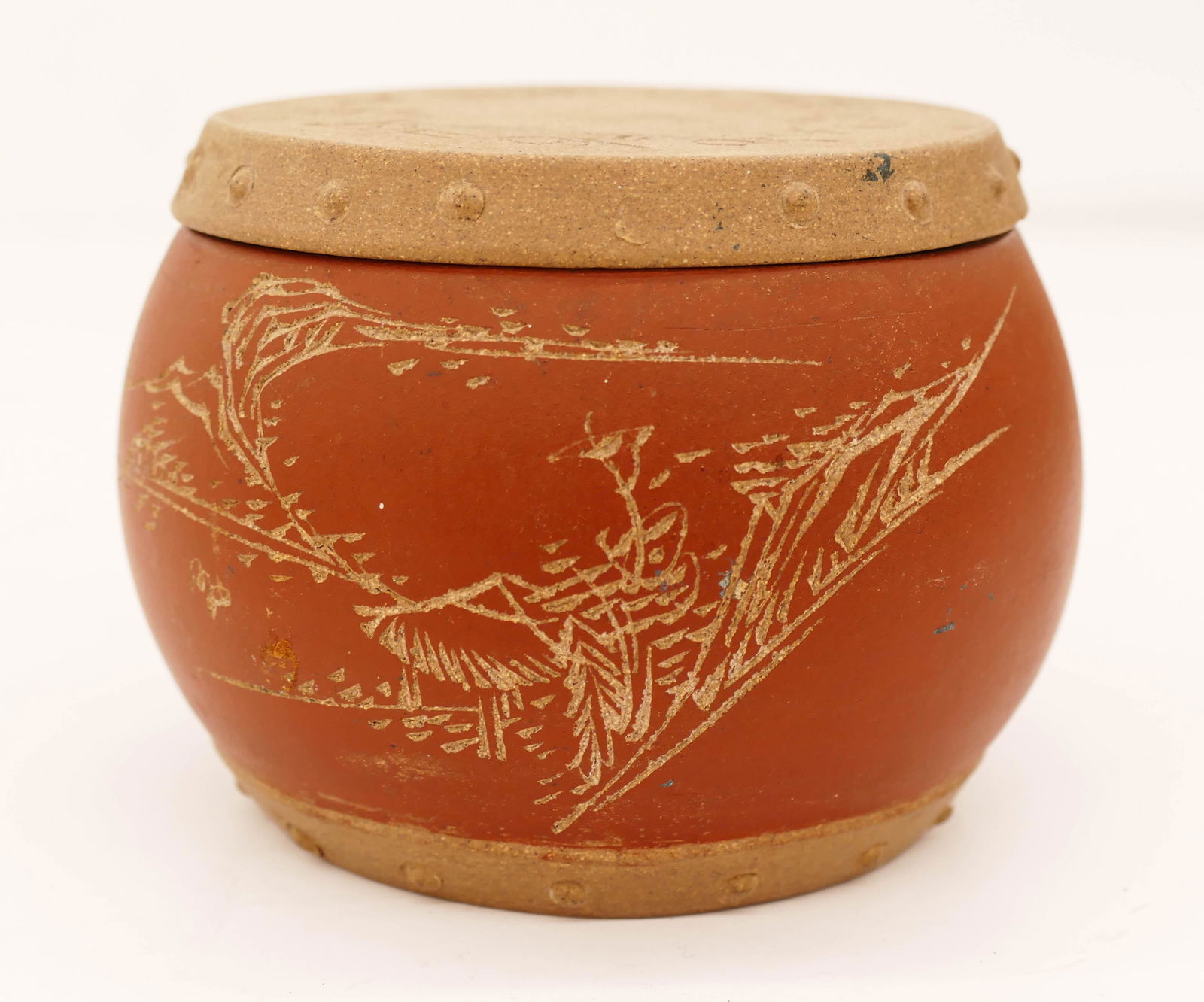 Chen Ding He Yixing Barrel Shaped Tea Jar 3''x4''. A: Chen Ding He Yixing Barrel Shaped Tea Jar 3''x4''. A two-color yixing jar with carved calligraphy and poem. Seal mark on bottom. Slight flake under lid edge. Overall excellent condition. Republic era.