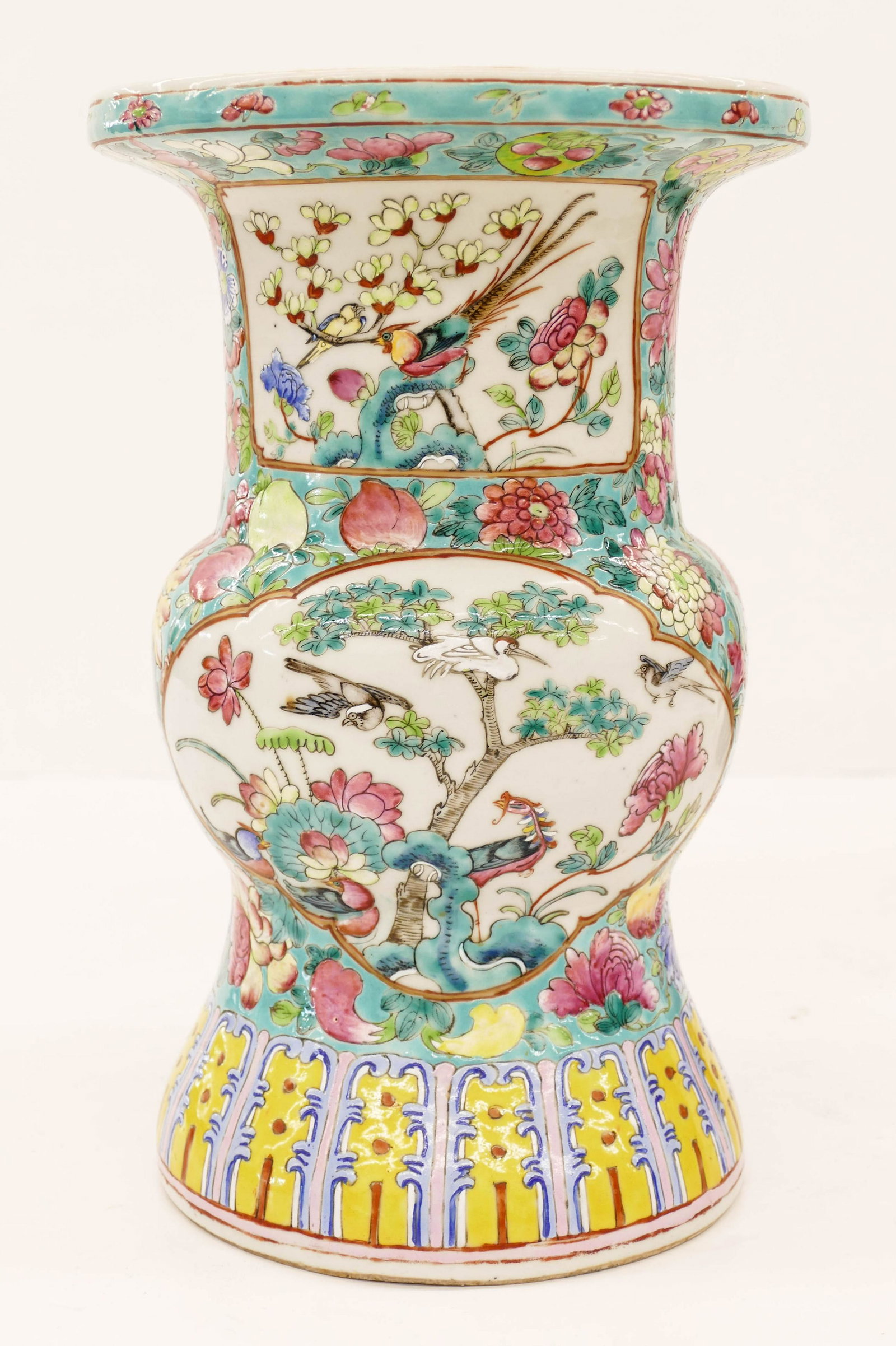 Chinese Qing Famille Rose Porcelain Beaker Vase: Chinese Qing Famille Rose Porcelain Beaker Vase 13.25''x8.5''. Polychrome enameled with pheasant and blossoming flower motifs. Unmarked. 4'' crack on one side medallion. 19th century.