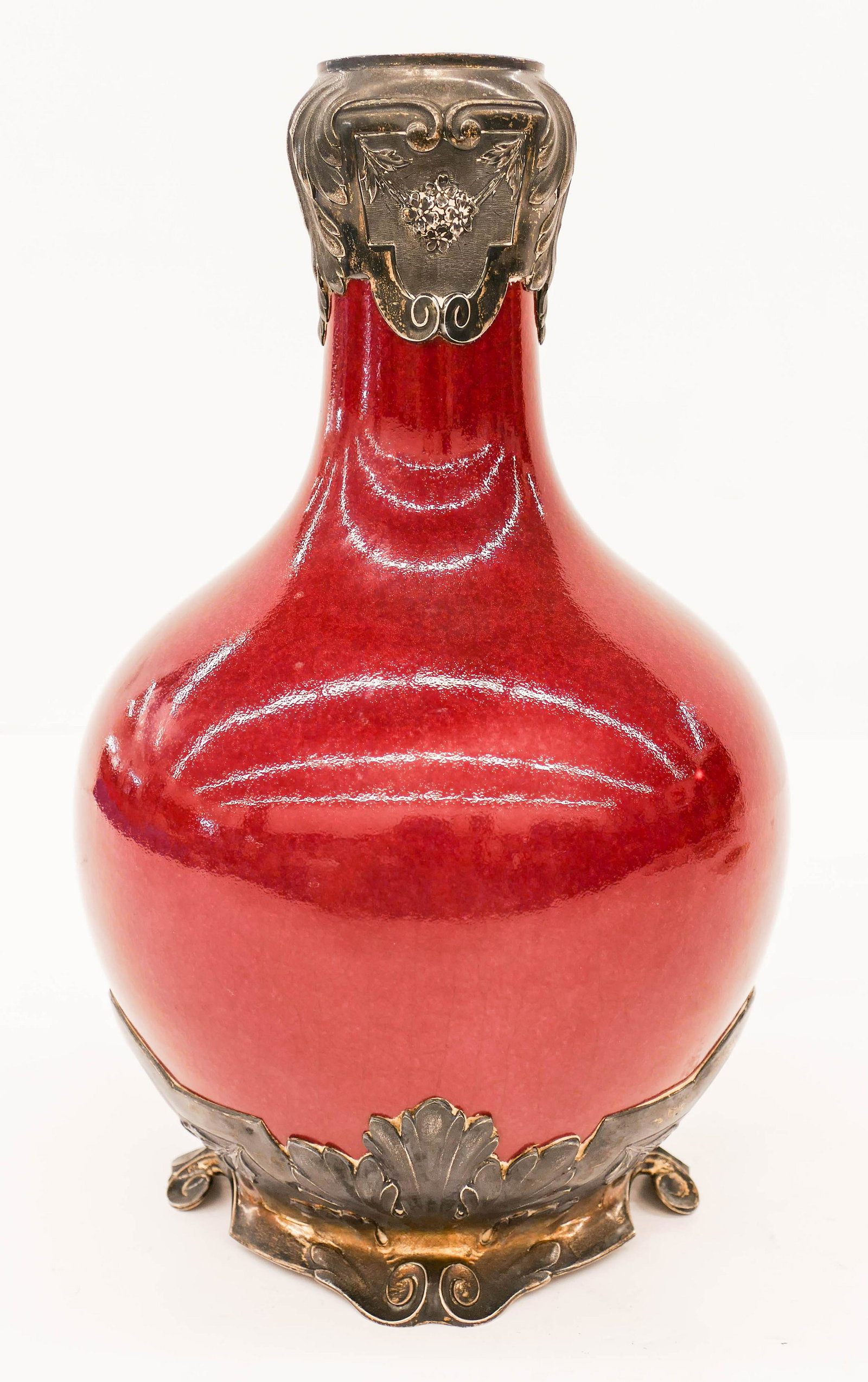 Chinese Qing Sang de Boeuf Silver Mounted Porcelain: Chinese Qing Sang de Boeuf Silver Mounted Porcelain Vase 12.25''x7.5''. An oxblood glazed garlic bulb vase with European sterling silver floral mounts. Visibly in excellent condition. 18th or 19th cen