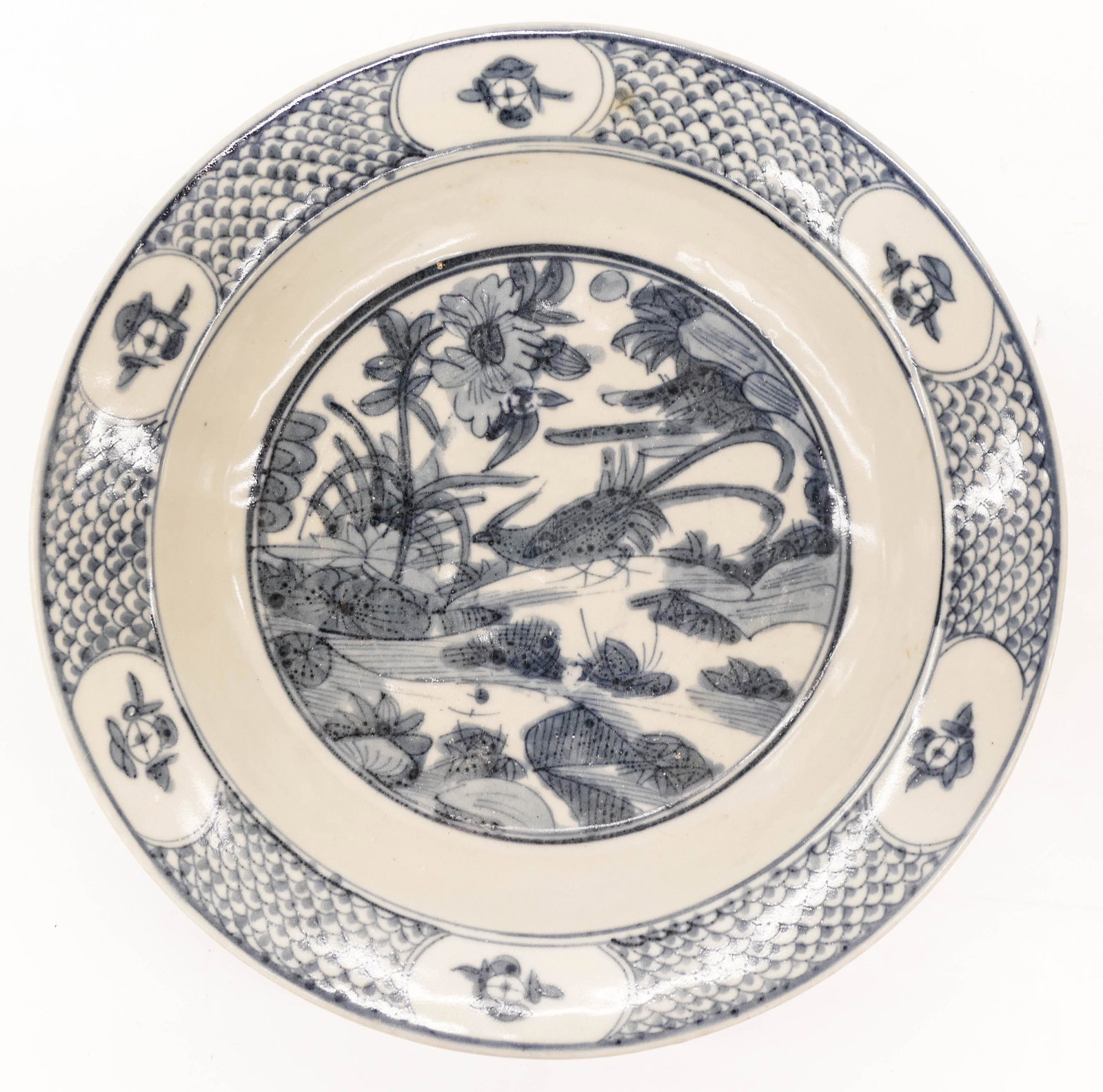 Chinese Ming Kraak Porcelain Shallow Bowl 11''x2.25''.: Chinese Ming Kraak Porcelain Shallow Bowl 11''x2.25''. Blue and white underglaze decoration with central pheasant and blossoming flower motif. Kiln frit on foot. Excellent condition with no damage. 16