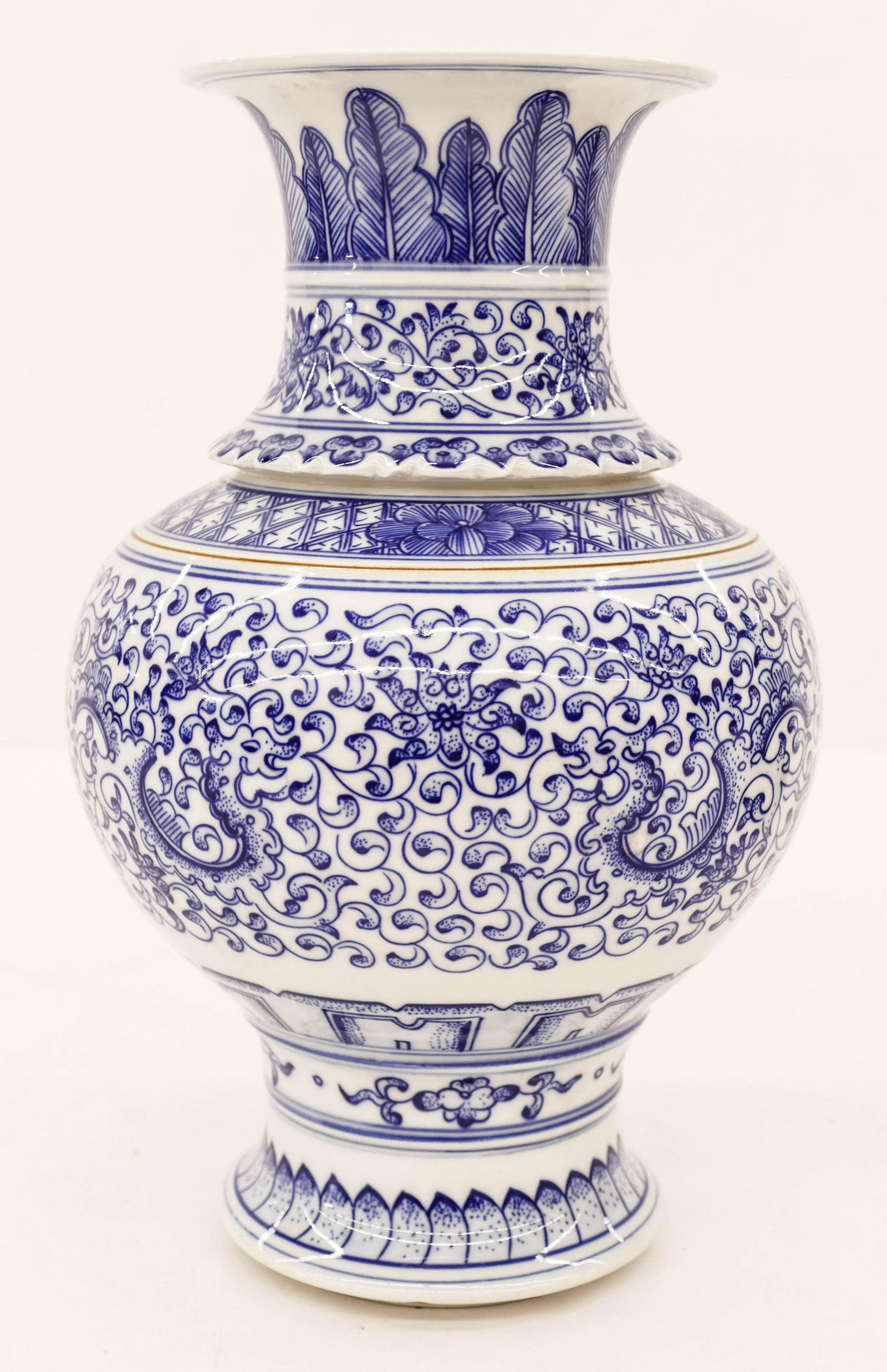 Chinese Jingdezhen Blue & White Porcelain Vase: Chinese Jingdezhen Blue & White Porcelain Vase 11''x6.5''. Fine blue underglaze scrolling lotus flower and archaistic dragon decoration. Blue underglaze Jing De Zhen Zun Yu Fan mark. Excellent conditi