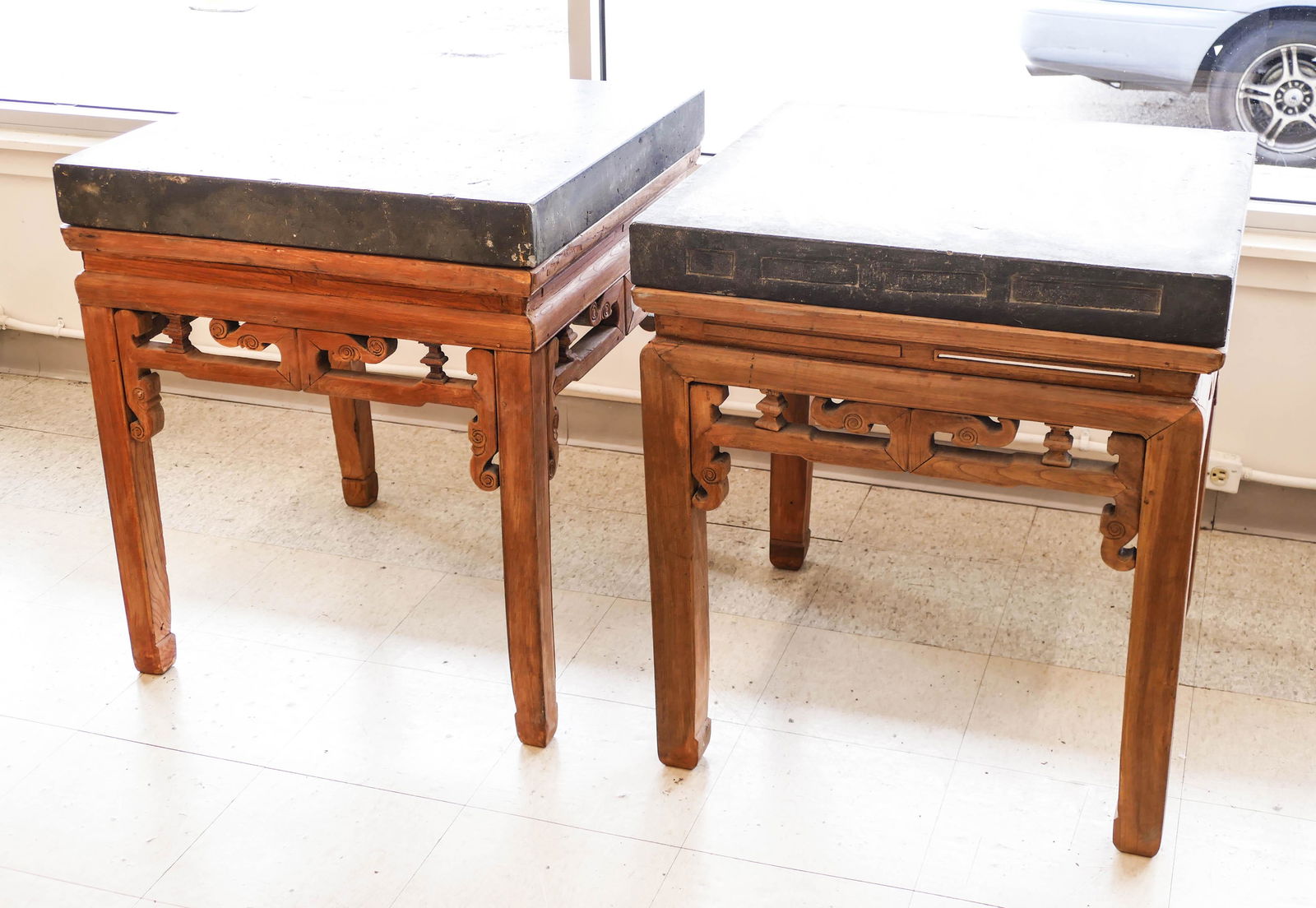 Pair Chinese Qing Jinzhuan Tile Tea Tables: Pair Chinese Qing Jinzhuan Tile Tea Tables 31''x27.5''x27.5''. A duo of thick black clay tile top elm wood square tea tables. Tops have heavy scattered wear with impressed chop marks on edges. 19th ce