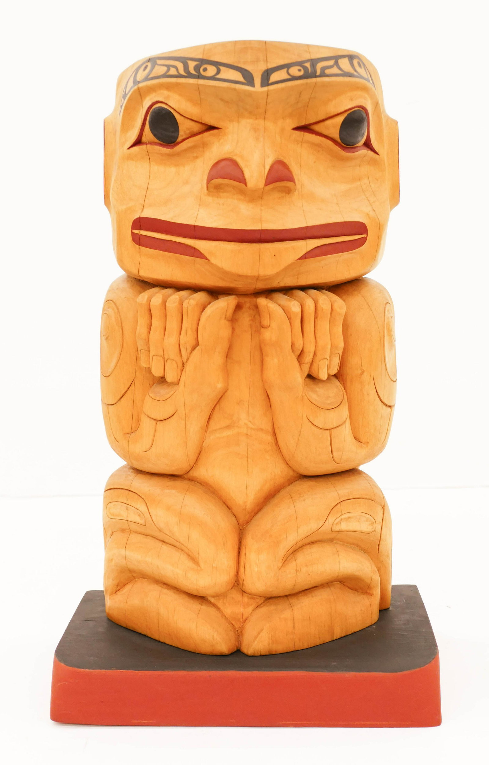 Terry Starr (b.1951 Tsimshian) Seated Human Figure: Terry Starr (b.1951 Tsimshian) Seated Human Figure Totem Pole 1998 Painted Alder 18''x11''x7''. A polychrome painted u-form relief carved totem on platform. Signed and dated on verso. Pole is separate