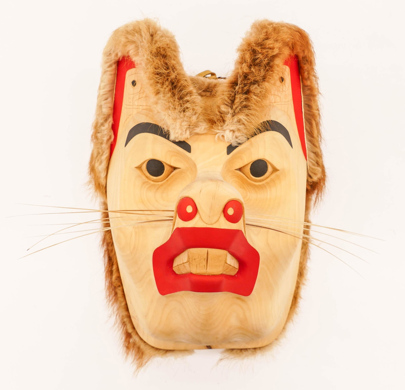Isaac Tait (1965-2000 Nisga'a) Chipmunk Mask Carved: Isaac Tait (1965-2000 Nisga'a) Chipmunk Mask Carved Cedar 15''x12''x9''. A carved and polychrome painted u-form animal mask. Signed on verso. Excellent condition. From the Ralph & Terrel Kaplan Collec