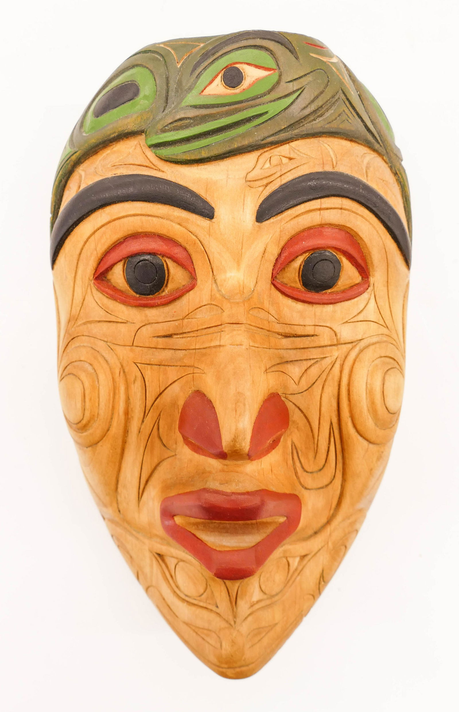 Floyd Joseph (b.1953 Salish) Frog Power Mask 1993: Floyd Joseph (b.1953 Salish) Frog Power Mask 1993 Painted Cedar 9.5''x6''x3.5''. A relief carved and painted u-form mask. Signed and titled on verso. Excellent condition. From the Ralph & Terrel Kapla