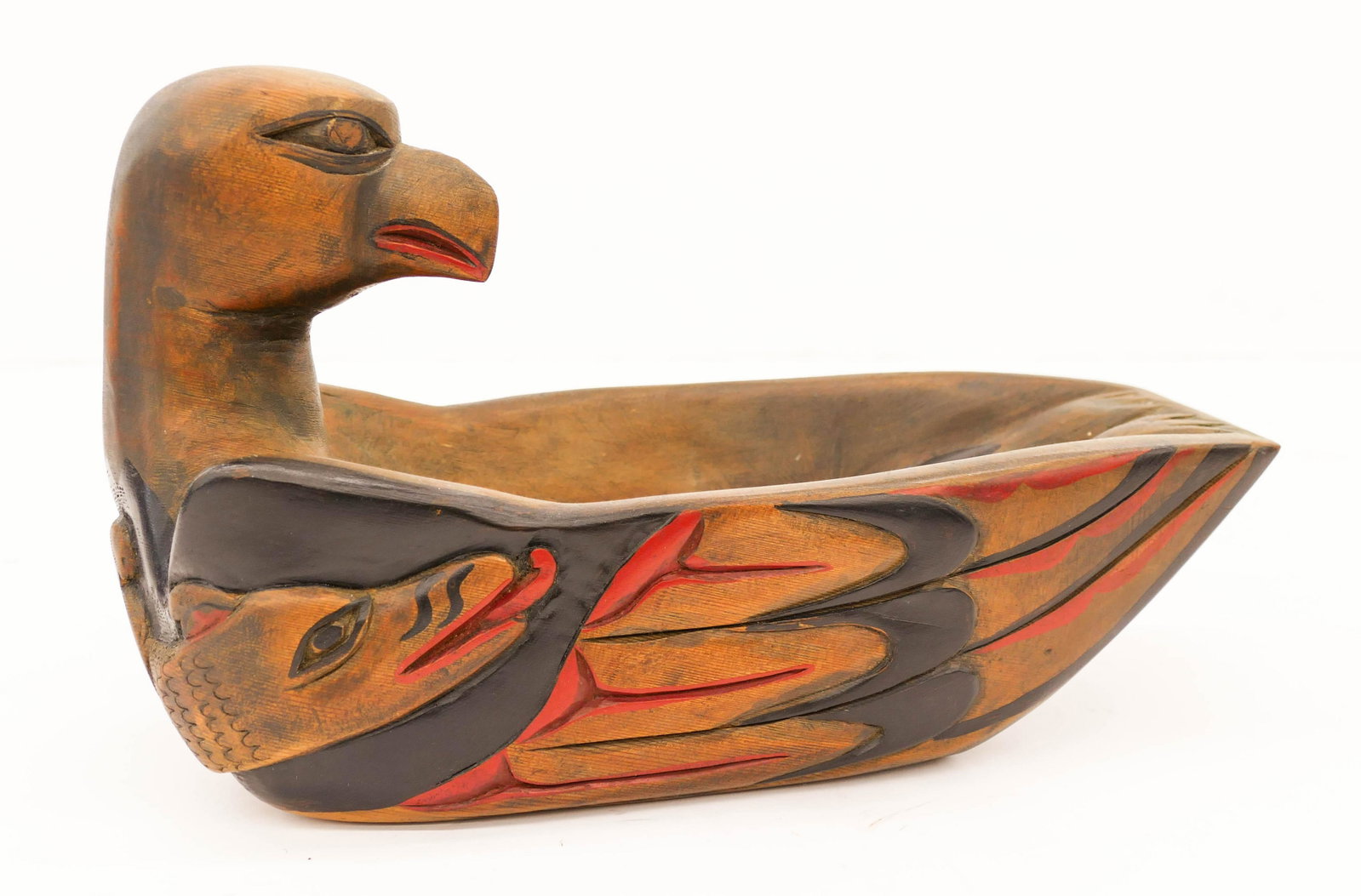 Jane Marston Kwatleematt (20/21st Cent. Salish) Eagle: Jane Marston Kwatleematt (20/21st Cent. Salish) Eagle and Sisiutl Bowl Painted Cedar 7.5''x12.5''. A polychrome painted u-form carved cedar grease bowl. Signed on bottom. Excellent condition. From the