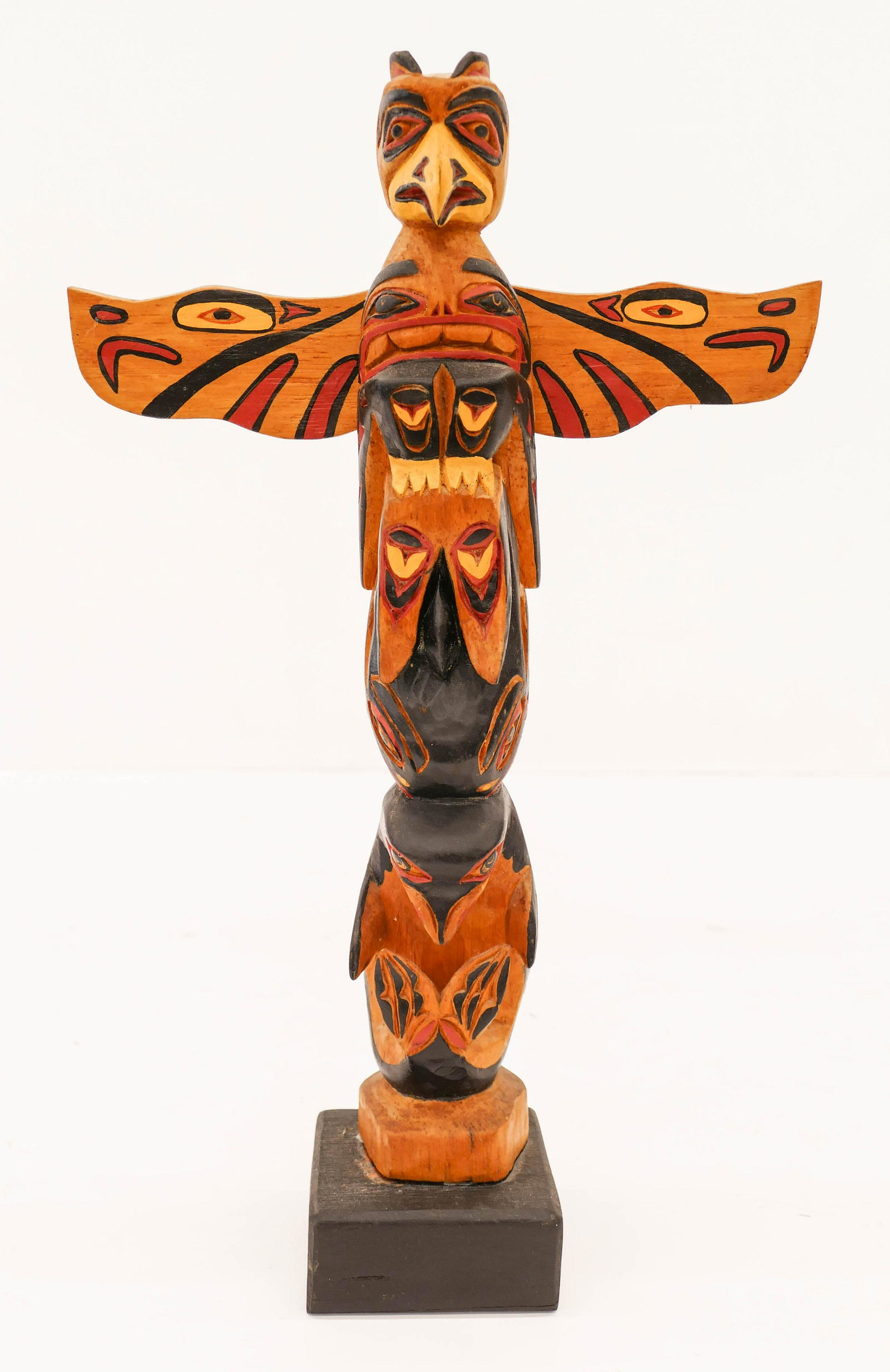 Simon Charlies (1919-2005 Cowichan) Thunderbird Totem: Simon Charlies (1919-2005 Cowichan) Thunderbird Totem Model 1977 Painted Cedar 16.5''x10.5''. Polychrome painted and carved thunderbird, whale, and beaver. Lightly signed and dated on verso. Reglued t
