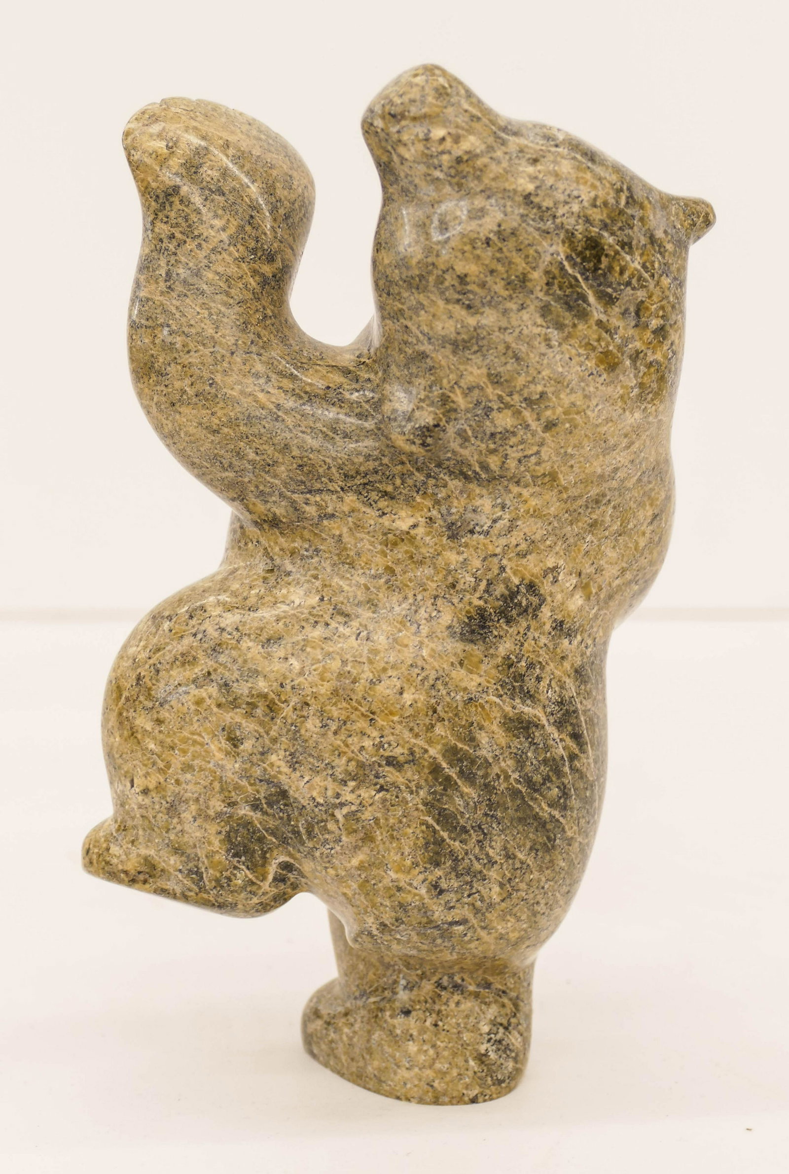 Markoosie Papigatok (b.1976 Inuit) Dancing Bear 2012: Markoosie Papigatok (b.1976 Inuit) Dancing Bear 2012 Serpentine Sculpture 7.5''x4.5''. A carved stone upright polar bear figure. Signed on bottom. Purchased from Inuit Gallery of Vancouver Ltd. and in