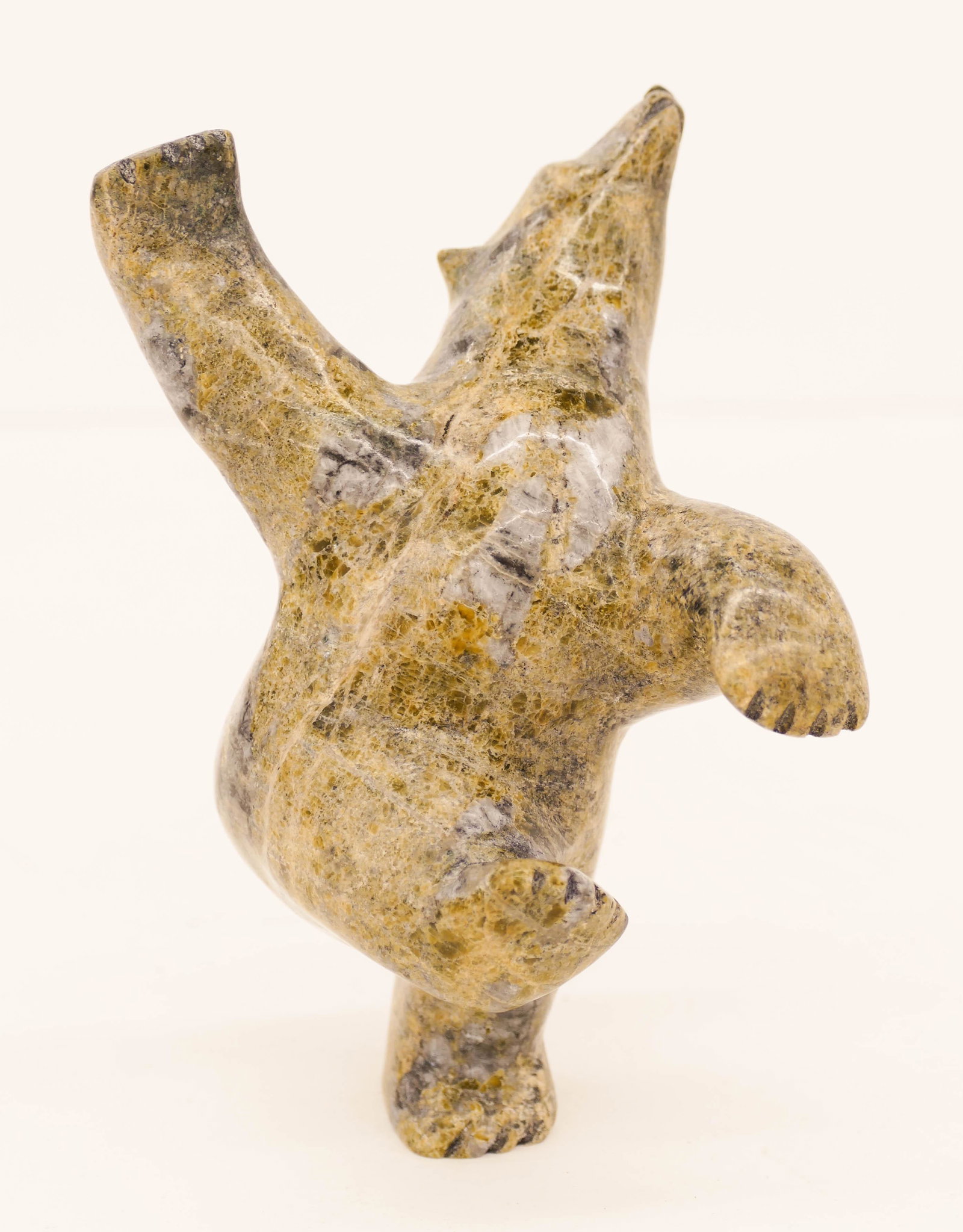 Noo Atsiaq (1985-2013 Inuit) Dancing Bear 2012: Noo Atsiaq (1985-2013 Inuit) Dancing Bear 2012 Serpentine Sculpture 5.5''x4''. A carved stone upright polar bear figure. Signed on bottom. Purchased Inuit Gallery of Vancouver Ltd. and included in Sma