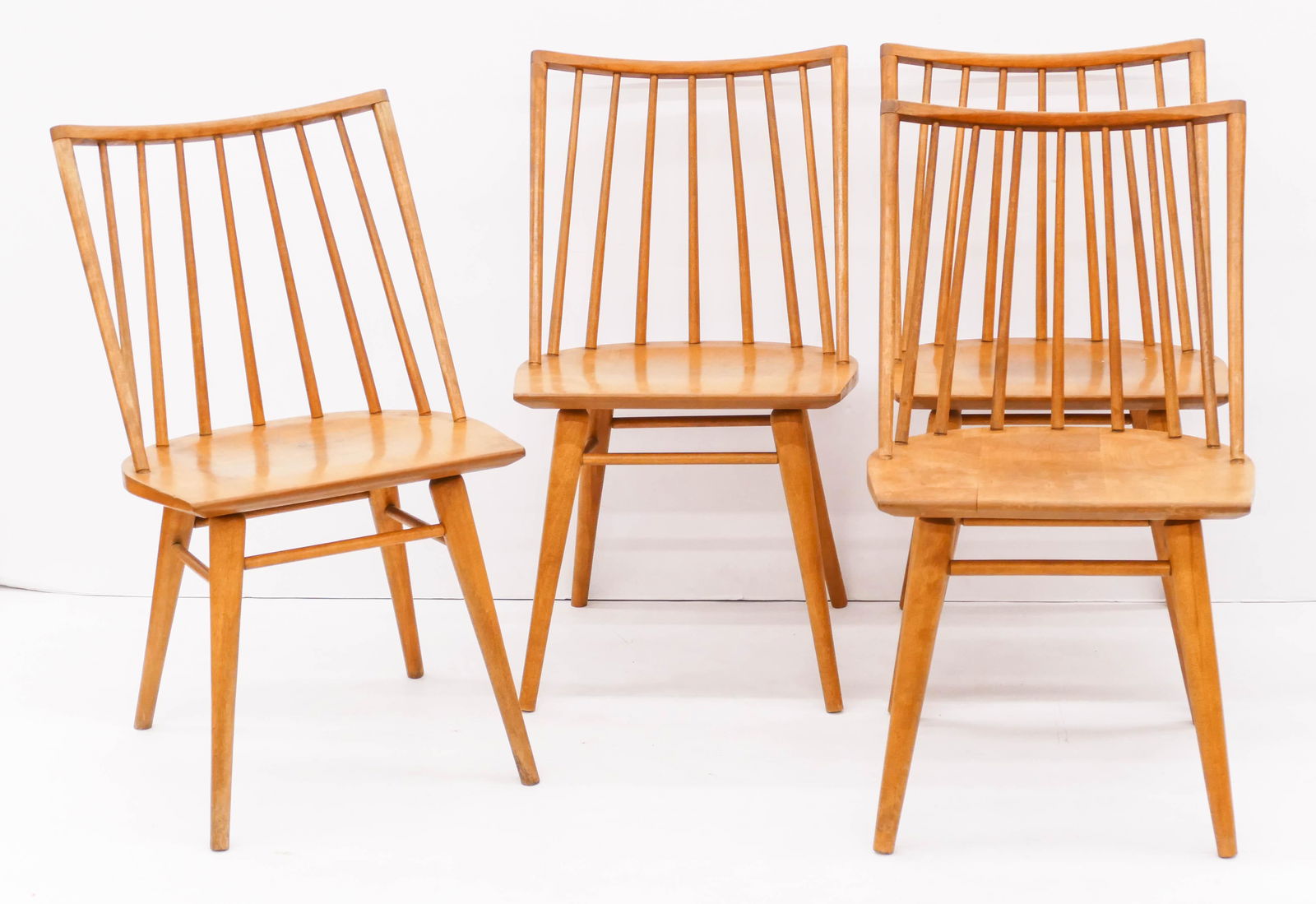 Set of Leslie Diamond for Conant Ball Windsor Dining: Set of Leslie Diamond for Conant Ball Windsor Dining Chairs 32''x18''x18''. Vintage set of four modern maple chairs with burned in marks on bottom. Some scattered light surface wear from use. One has