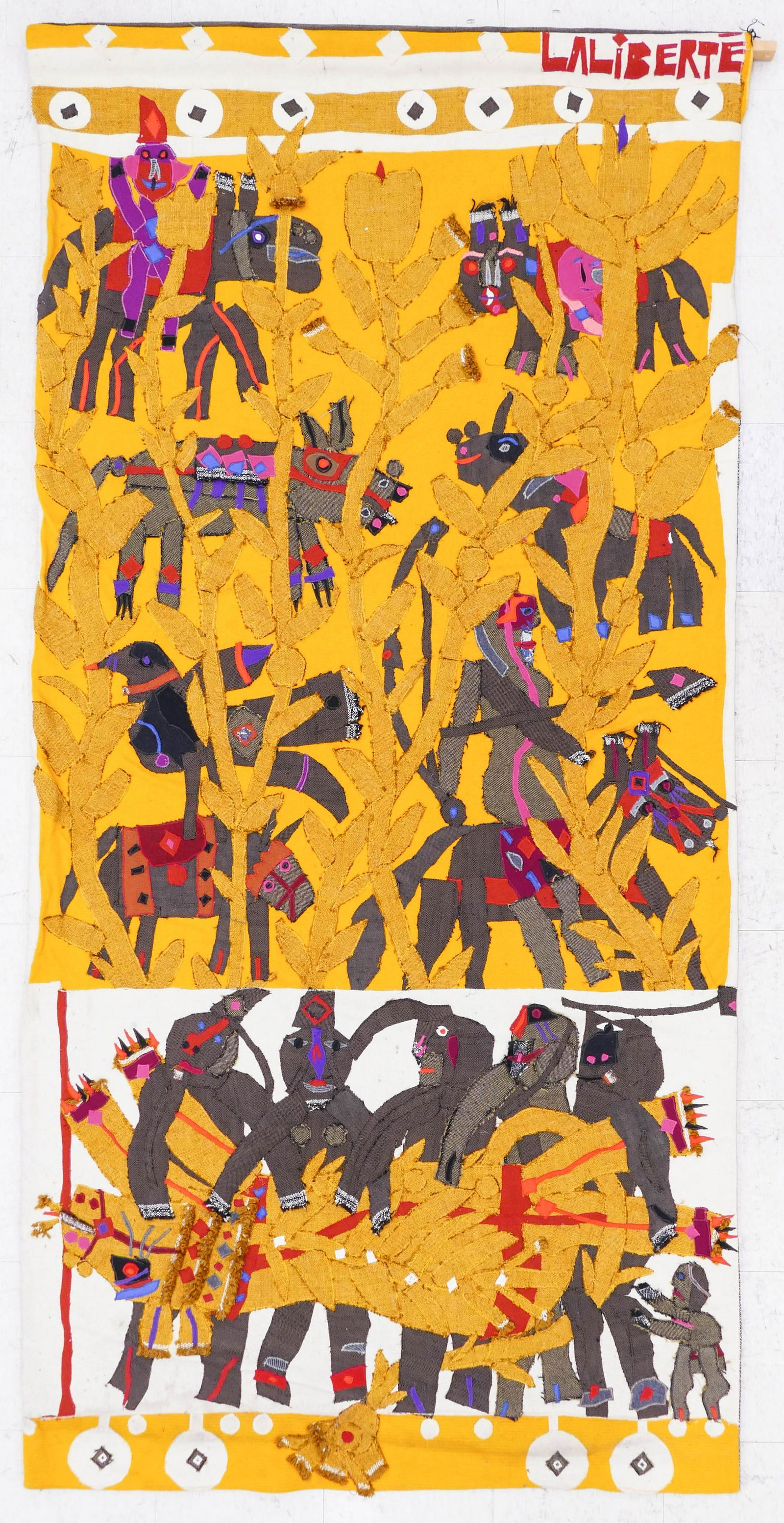 Norman LaLiberte (b.1925 American) ''The Hunt'' 1974: Norman LaLiberte (b.1925 American) ''The Hunt'' 1974 Fabric Applique 102''x50''. Impressive large hanging fiber art banner depicting a primitive hunt. Signed upper right and titled on verso. Some mino