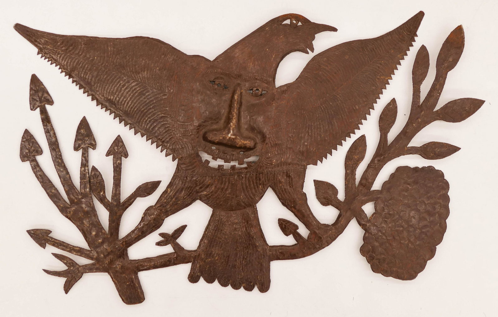 Joseph Louis Juste (20th Cent. Haitian) ''Bird Man'': Joseph Louis Juste (20th Cent. Haitian) ''Bird Man'' Cut Steel 19''x30''. A primitive wall sculpture from Haiti. Signed on front. Excellent condition.
