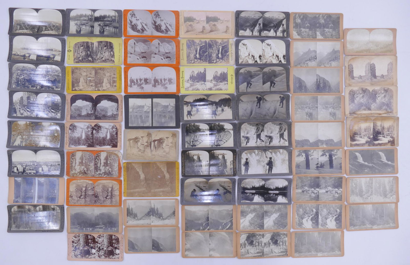 59pc Group Stereoview Cards- Views of the West: 59pc Group of Antique Stereoview Cards. Includes views of Seattle, Washington, Columbia River, Mountaineering in British Columbia, Canada, Alaska, San Fransico Fire, and Yosmite, Etc. Some wear from a