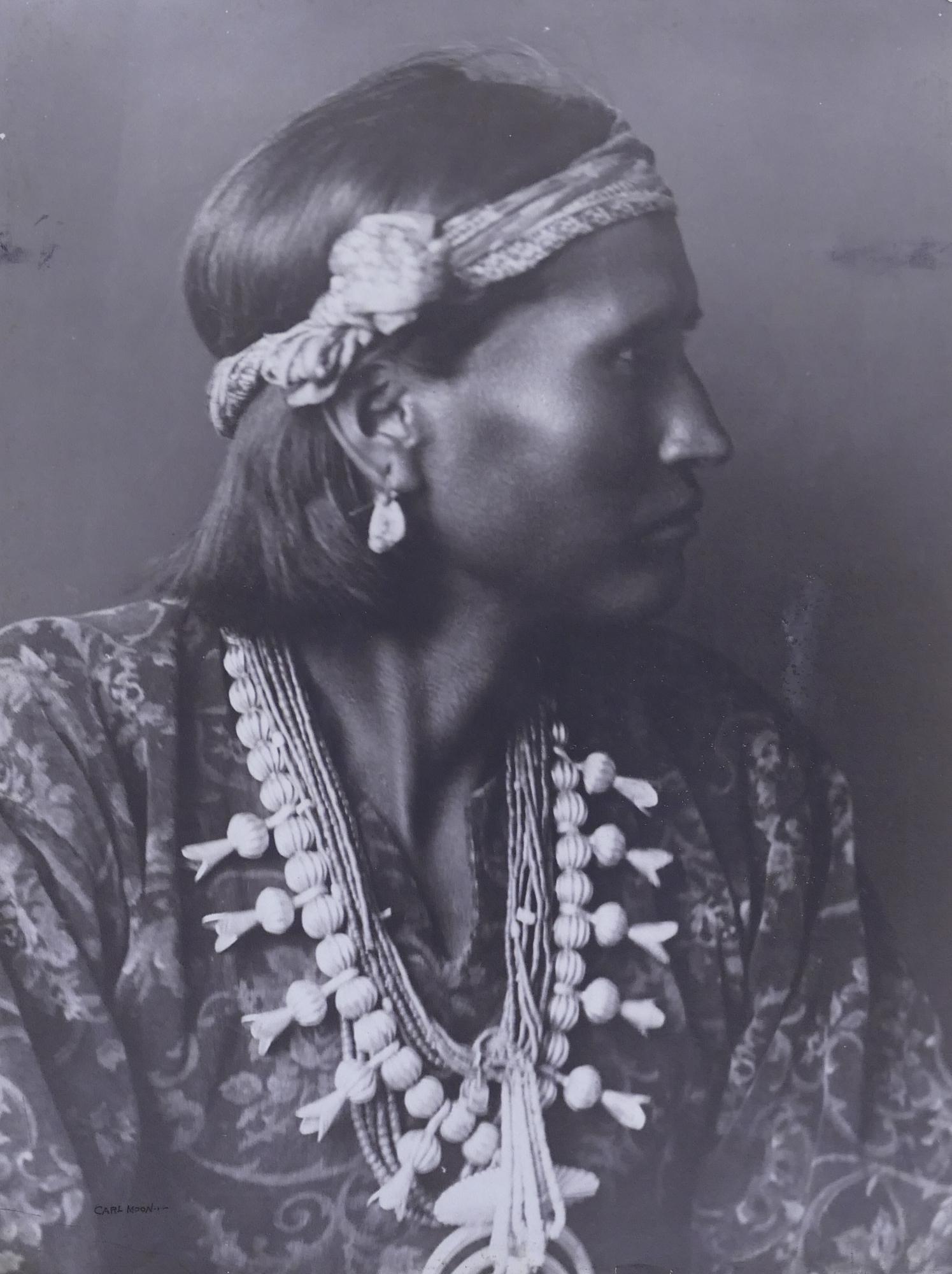 Carl Moon (1878-1948, California) Do-Bazin, Navajo: Carl Moon (1878-1948, California) 'Do-Bazin, Navajo' Black & White Print, 1906. On wove paper, mounted to cardboard. Print measures 23.5 x 17.5''. Signed at lower left corner. Scattered foxing and wea