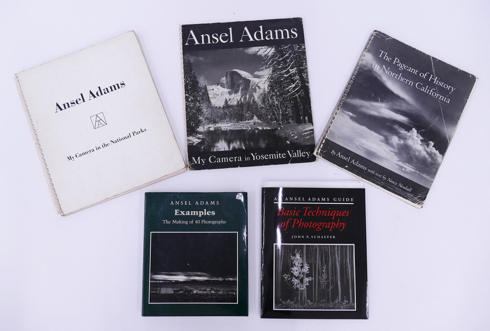 Signed Ansel Adams Book: Group of Ansel Adams Books with Signed 'My Camera in the National Parks'. Includes 3 spiral bound books, one hard bound book, and one unbound item. Books are 'My Camera in Yosemite Valley' (1949) sign